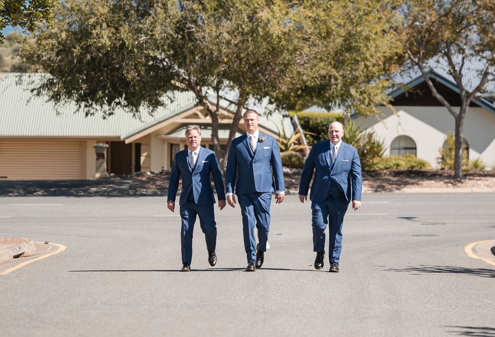 white hill estate wedding - catherine & sean 271 Groomsmen walking on road