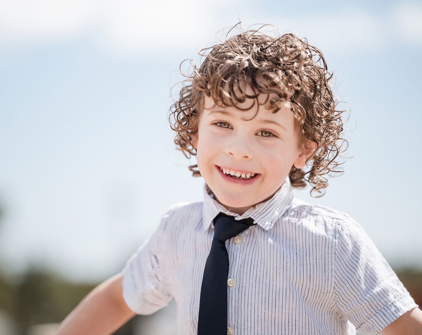 white hill estate wedding - catherine & sean 287 Happy boy with curly hair