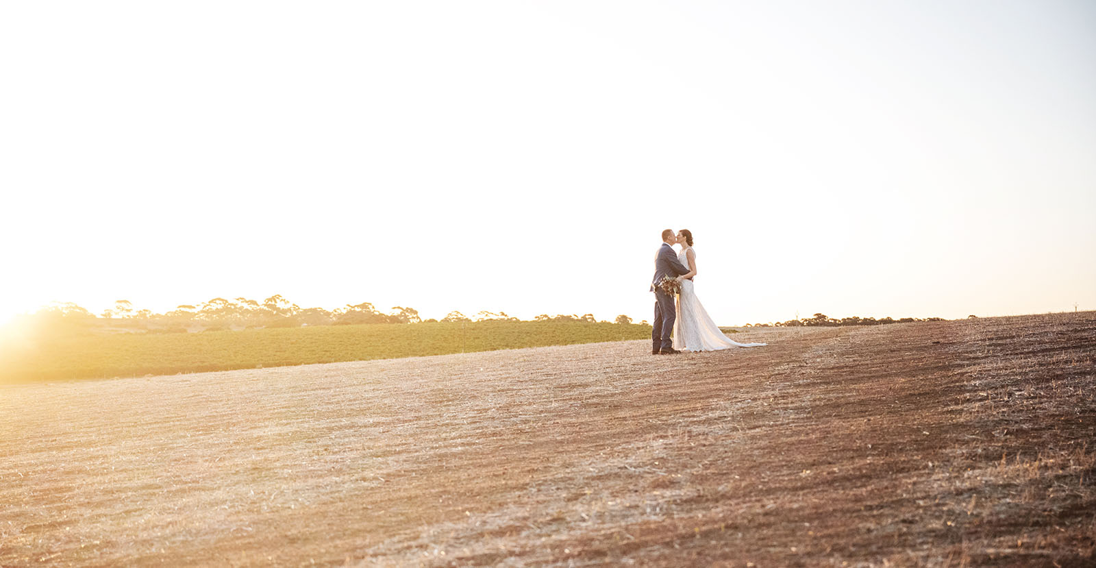 white hill estate wedding - catherine & sean 316 Kiss in open field
