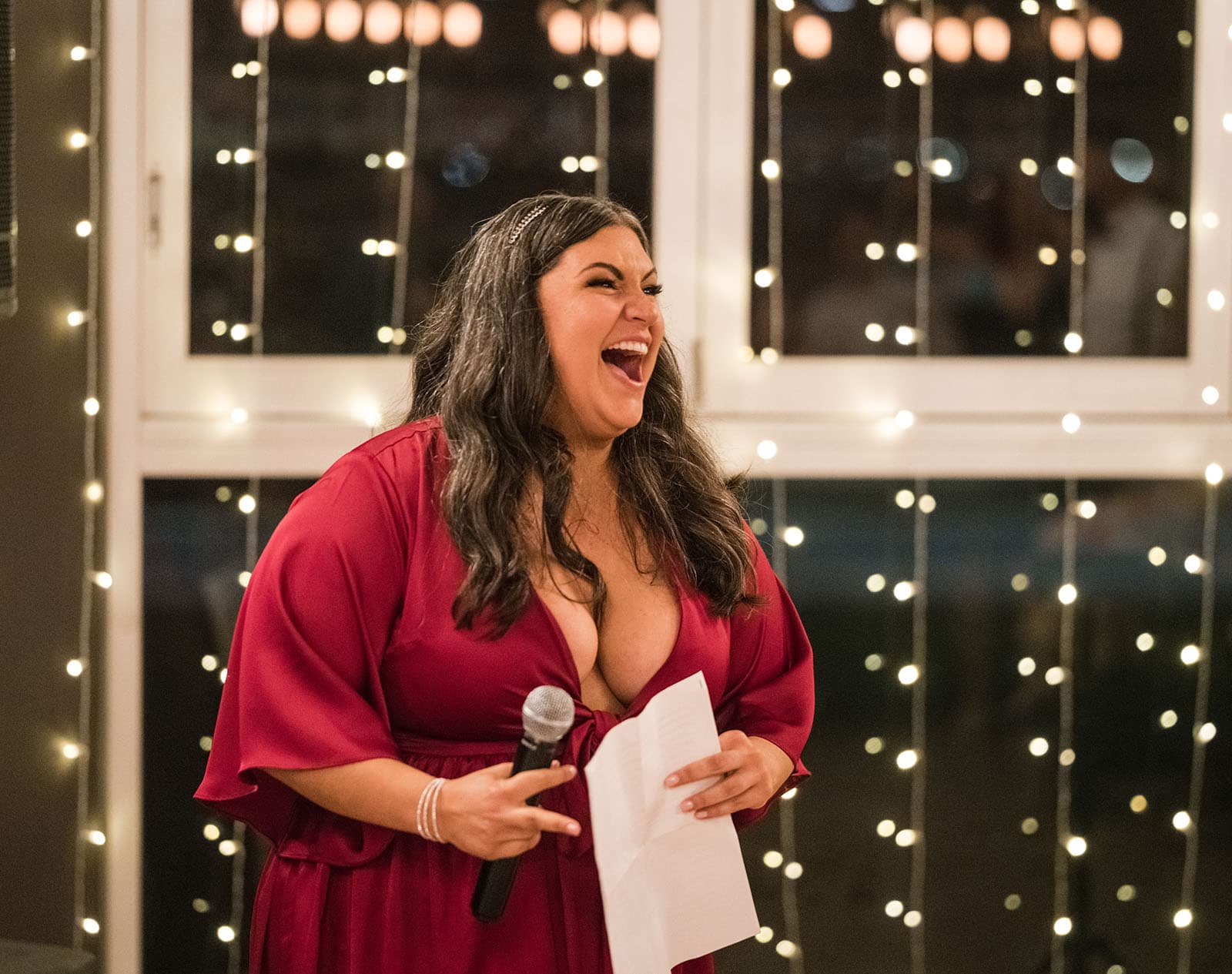 sneakys wedding - ash & michael 118 laughing maid of honour during speech