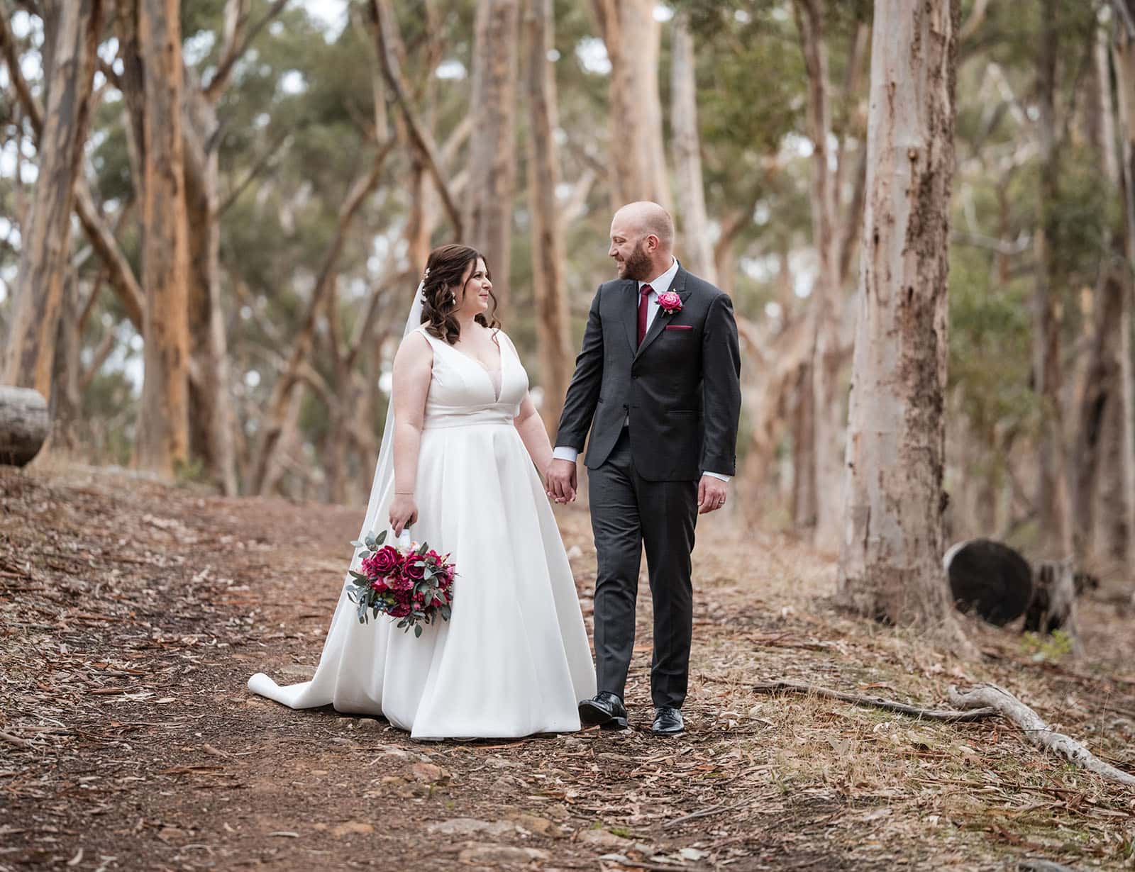 ten22 wedding - julia & daniel 167 Newly weds walking throguh forest