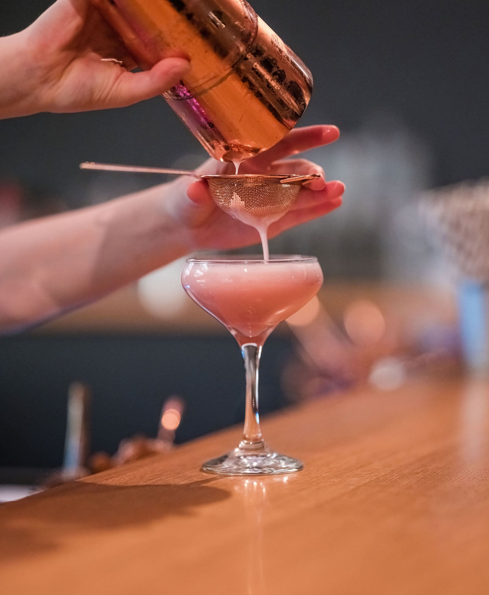 northern palm garden wedding - nicole & daryl 148 Pouring pink cocktail