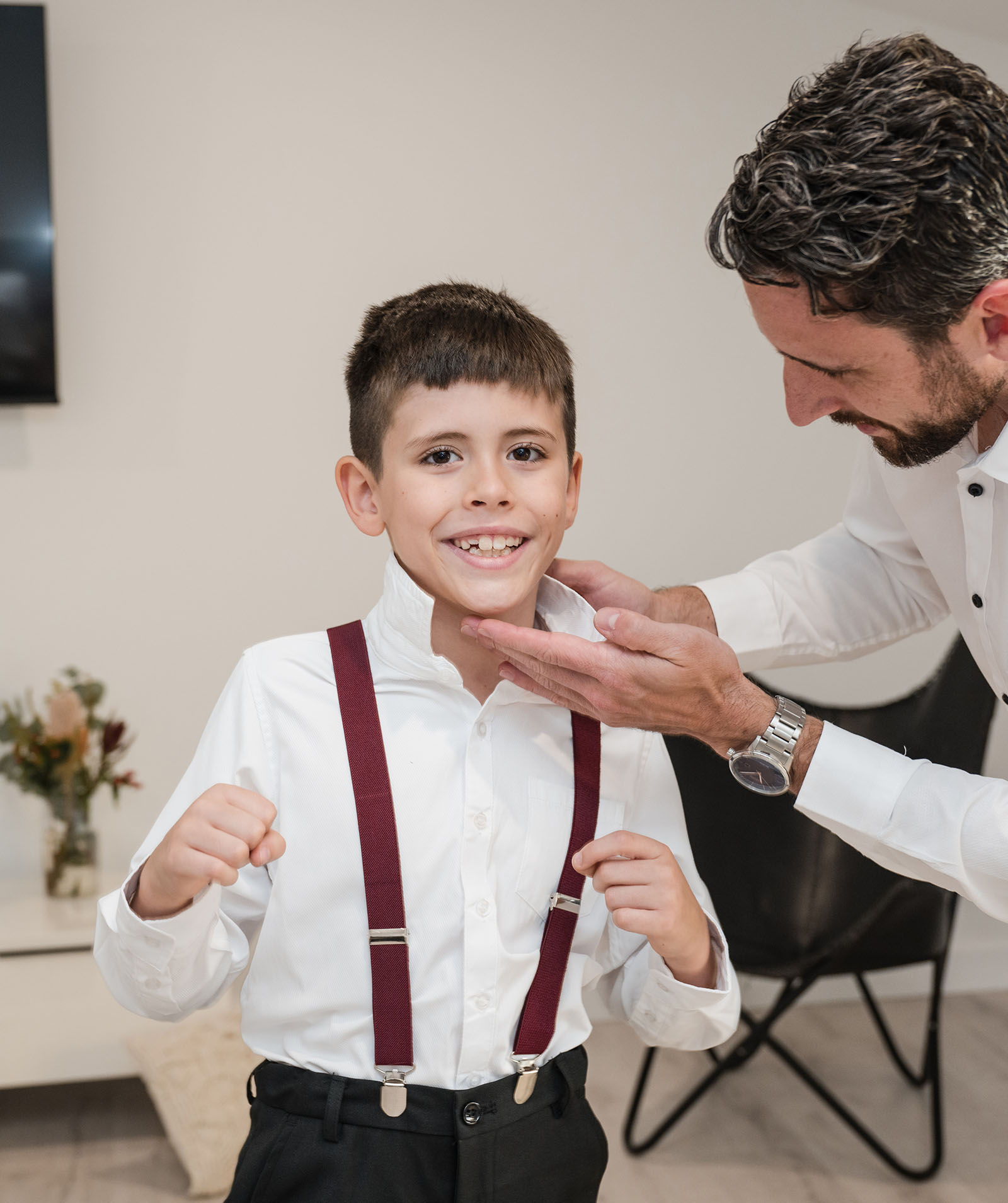 sneakys wedding - ash & michael 49 Smiling boy getting ready