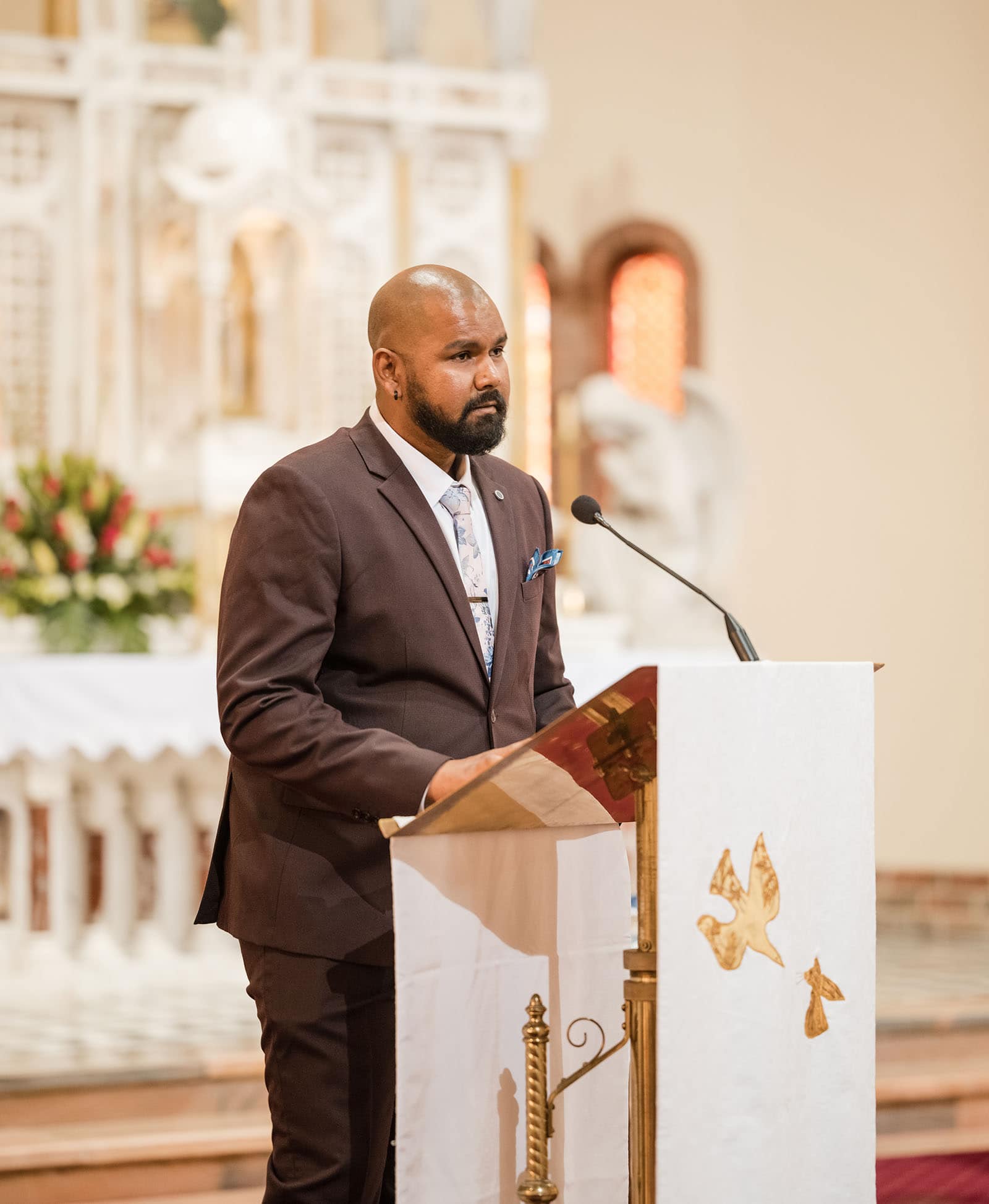 our lady of the rosary church wedding - lorraine & wayne 161 Speaker at lecturn