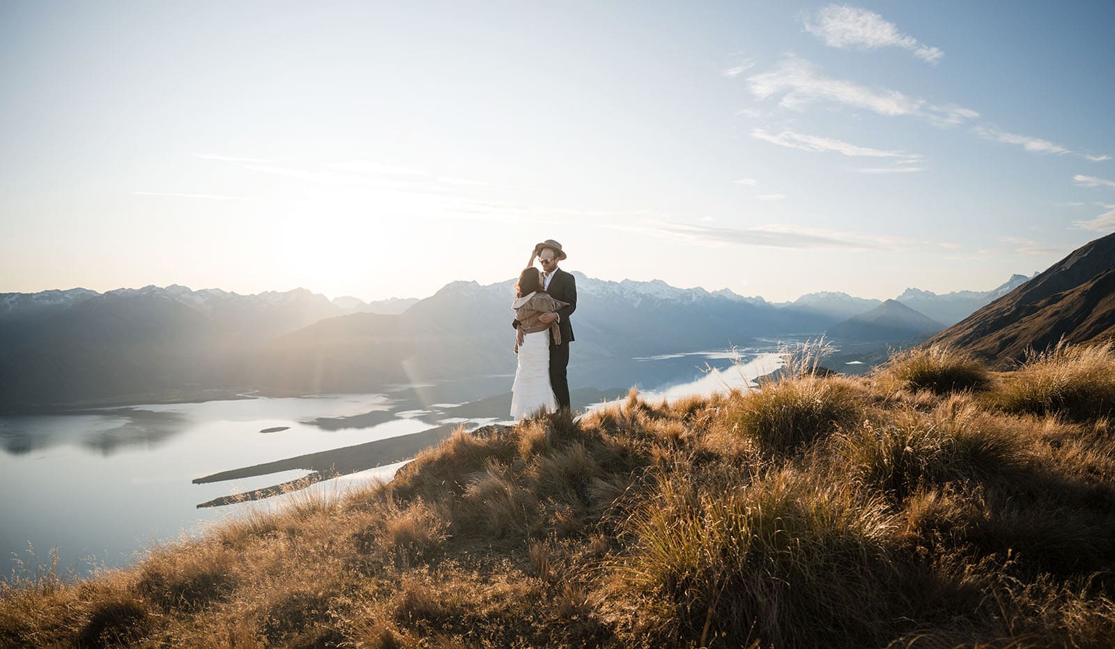 incredible queenstown wedding photoshoot - wendy & frank 49 bridal hugs in front of Milford Sound