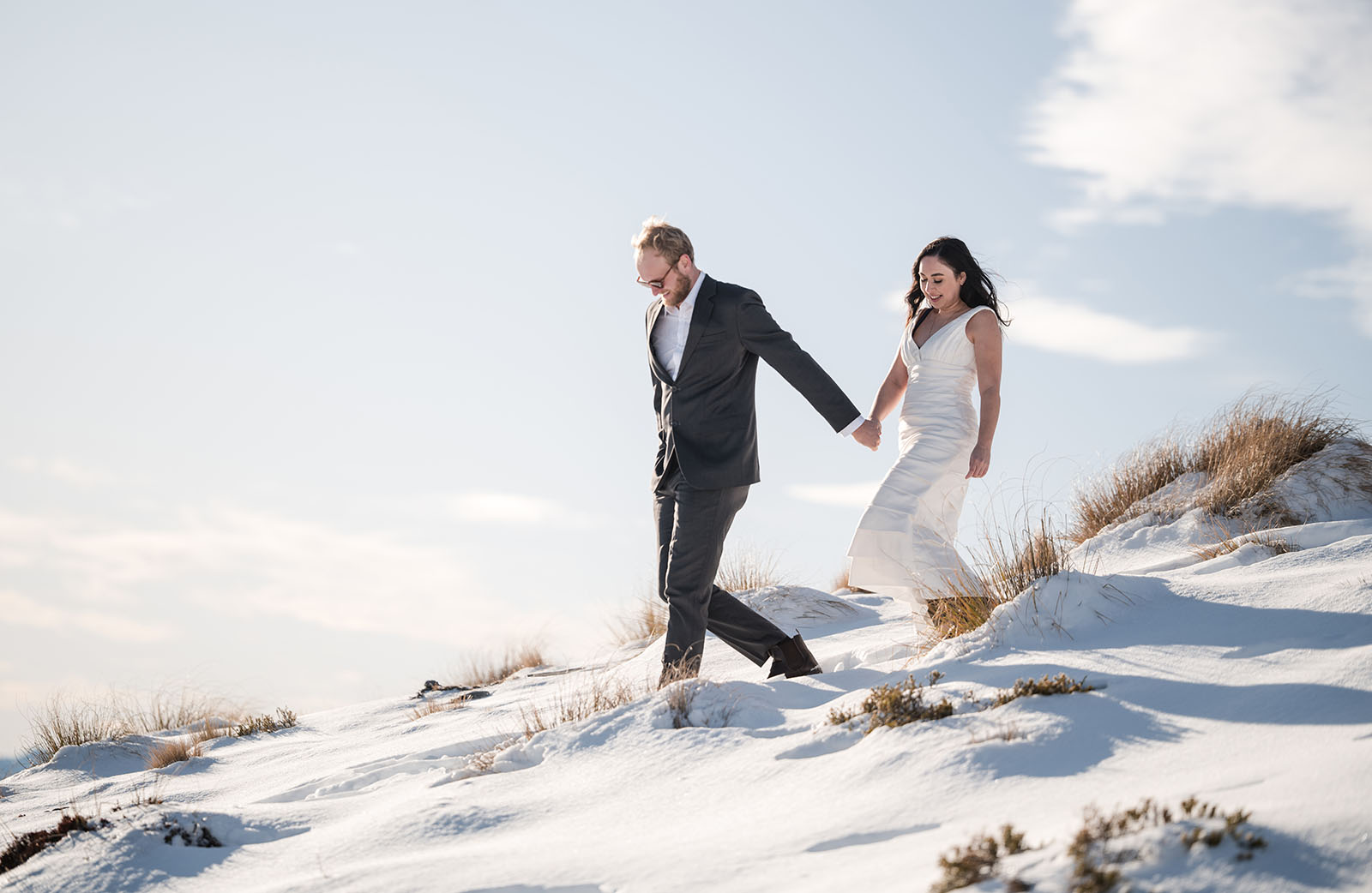 incredible queenstown wedding photoshoot - wendy & frank 31 groom leading bride in snow