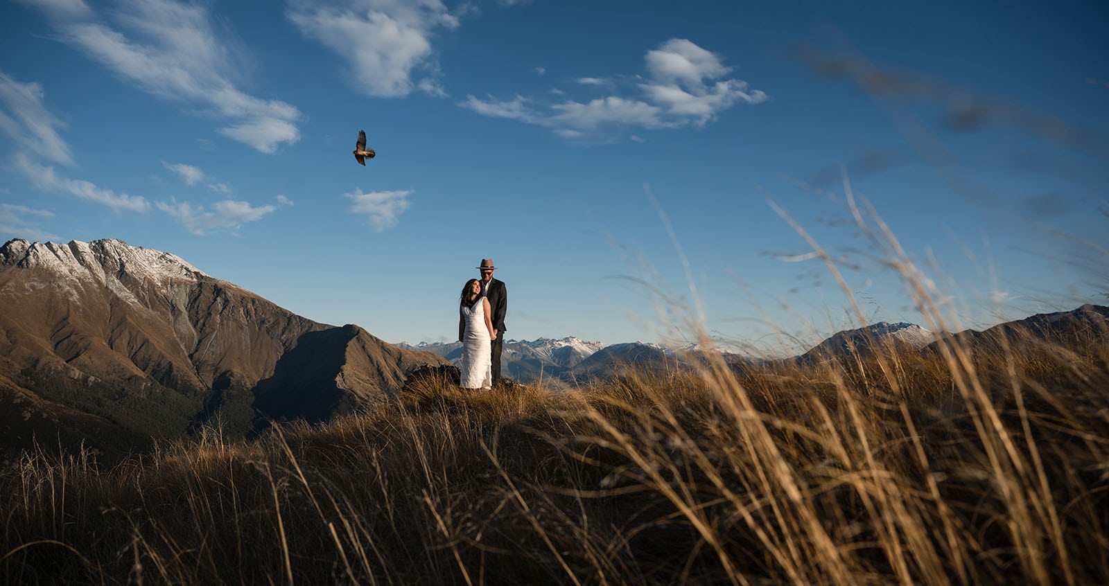 incredible queenstown wedding photoshoot - wendy & frank 41 Queenstown wedding photo with falcon