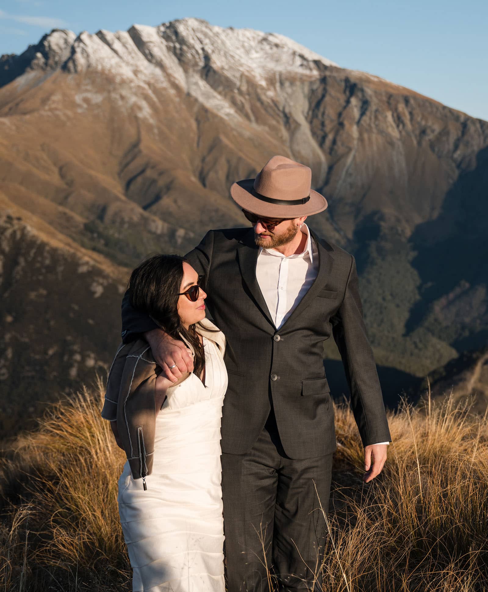 incredible queenstown wedding photoshoot - wendy & frank 43 Talking bride and groom in front of mountain
