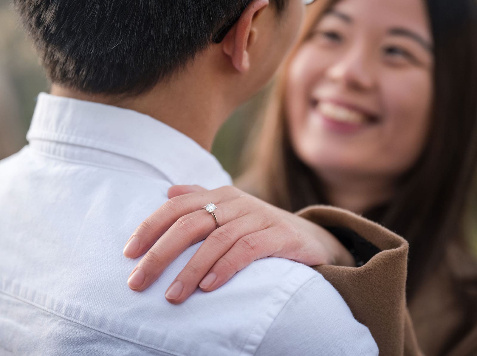 belair train station engagement shoot - melody & chris 104 Closeup of engagement ring on shoulder