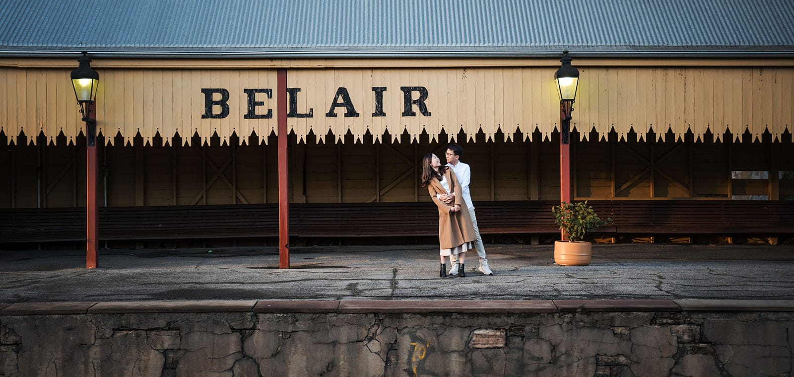 belair train station engagement shoot - melody & chris 87 Couple standing in front of Belair Train Station
