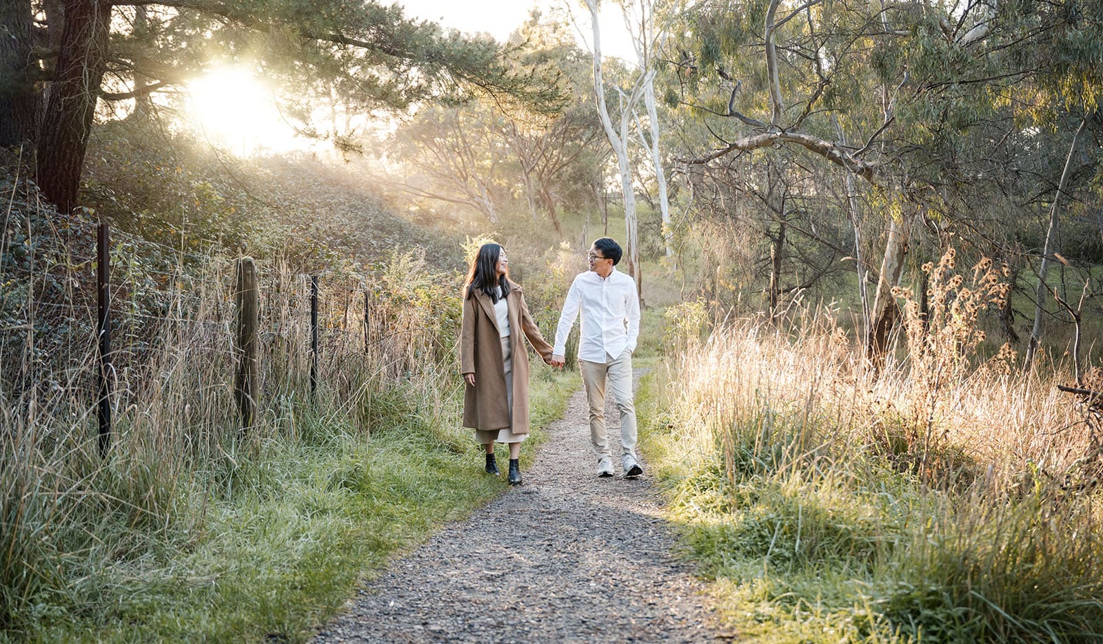 belair train station engagement shoot - melody & chris 109 Couple walking through belair national park