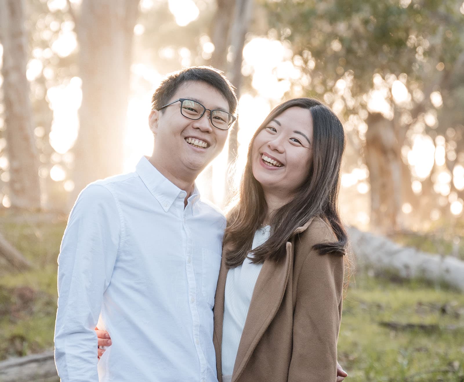 belair train station engagement shoot - melody & chris 97 Laughing couple with sun in background