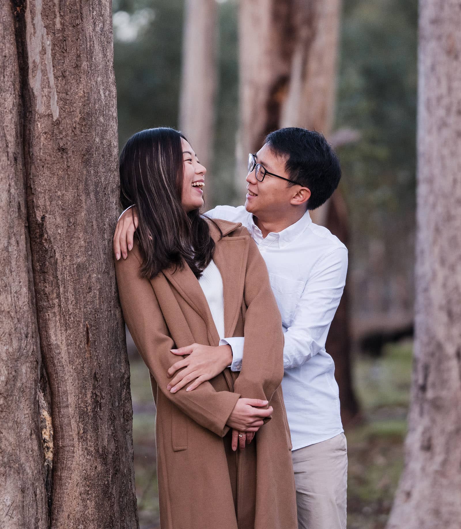 belair train station engagement shoot - melody & chris 89 Leaning on gum trees together