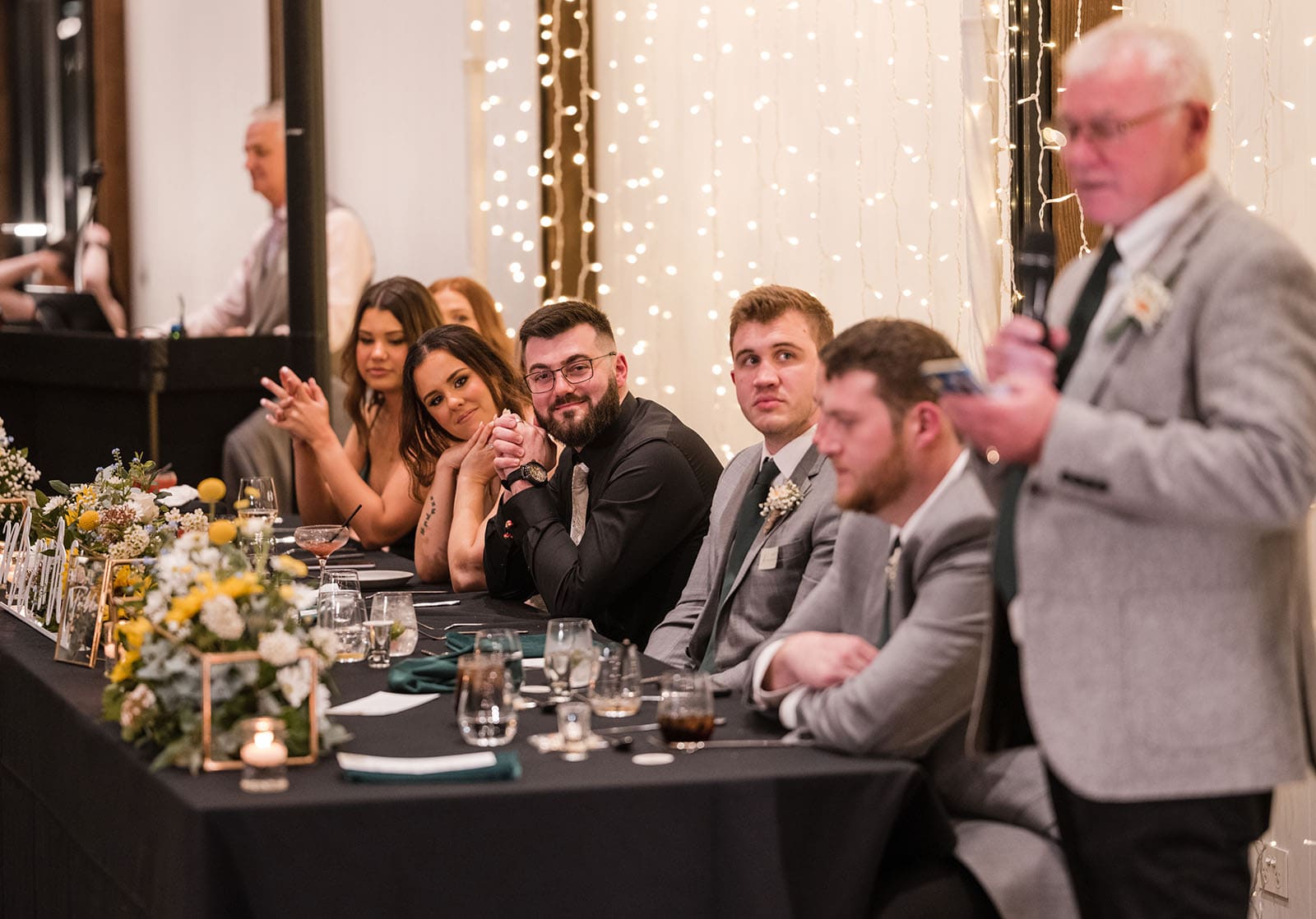 the house on haines wedding - emily & andrew 233 Bride and groom listening to speech