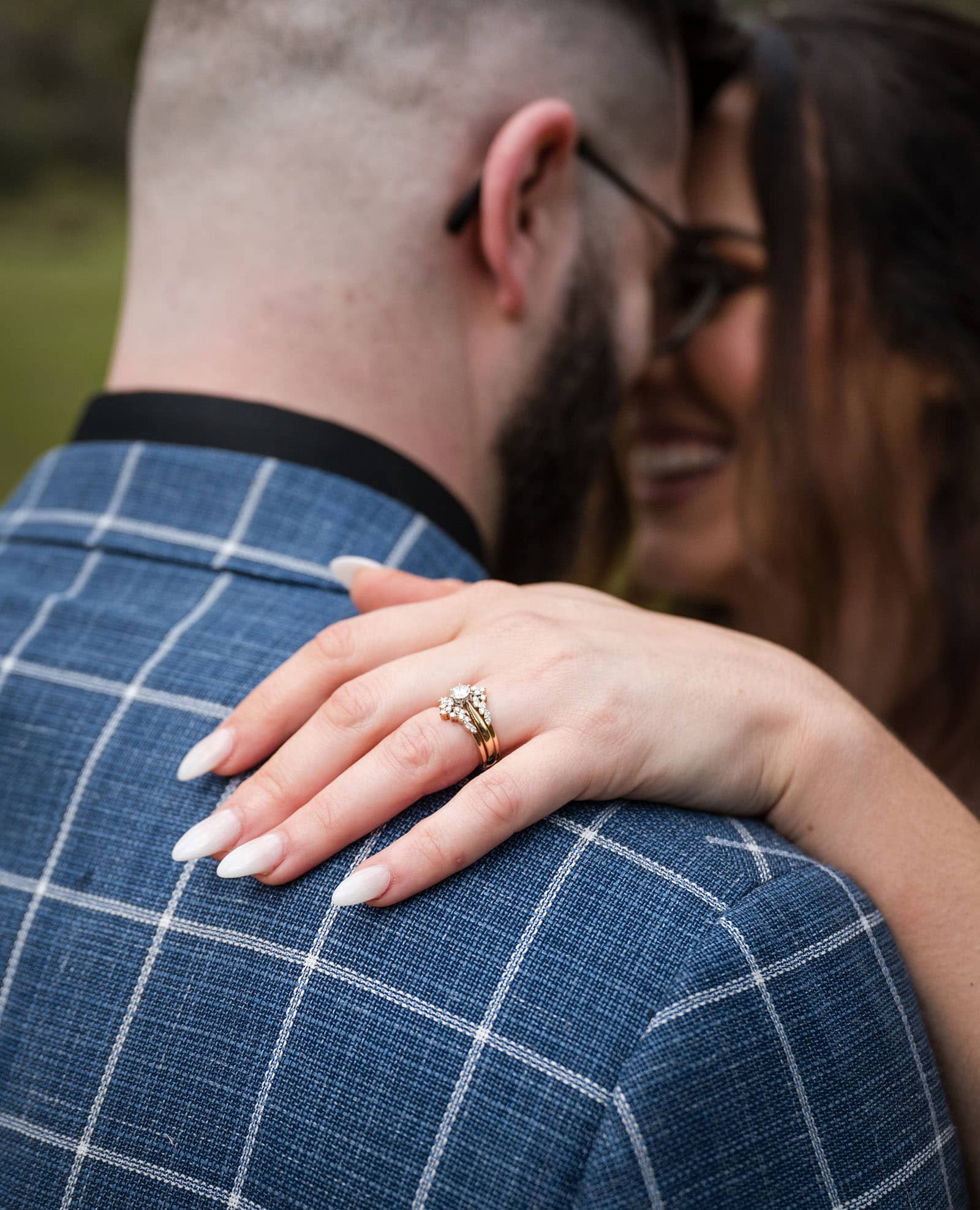 the house on haines wedding - emily & andrew 218 Closeup on engagement ring on finger