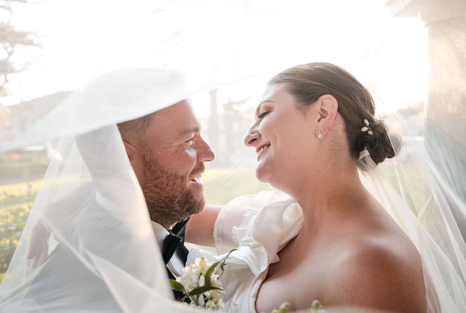 glenelg's partridge house wedding - emma & steven 157 Bride and groom smiles under veil