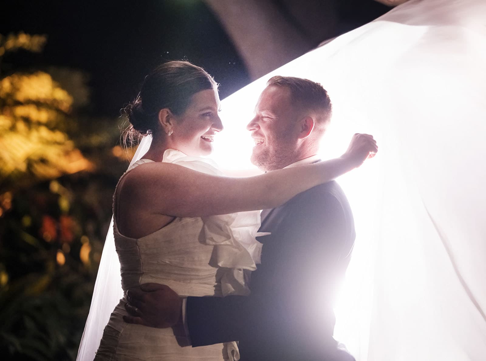 glenelg's partridge house wedding - emma & steven 167 Bride and groom under veil at night