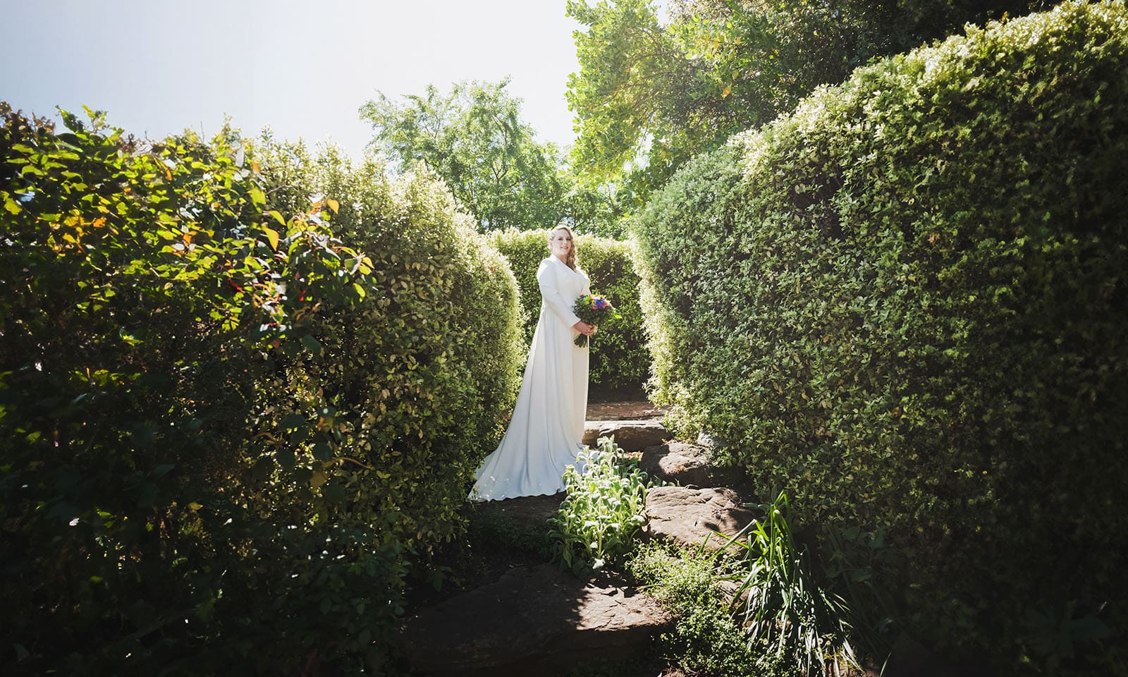 tiny house on the prairie wedding - kat & stacey 68 Bride standing in garden
