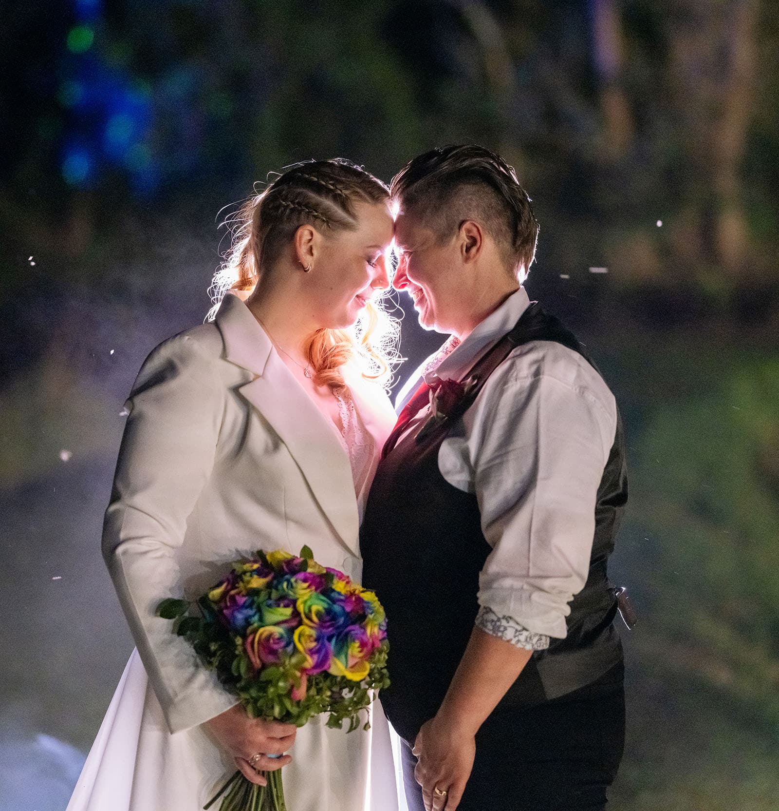 tiny house on the prairie wedding - kat & stacey 121 Brides at night with backdrop of smoke
