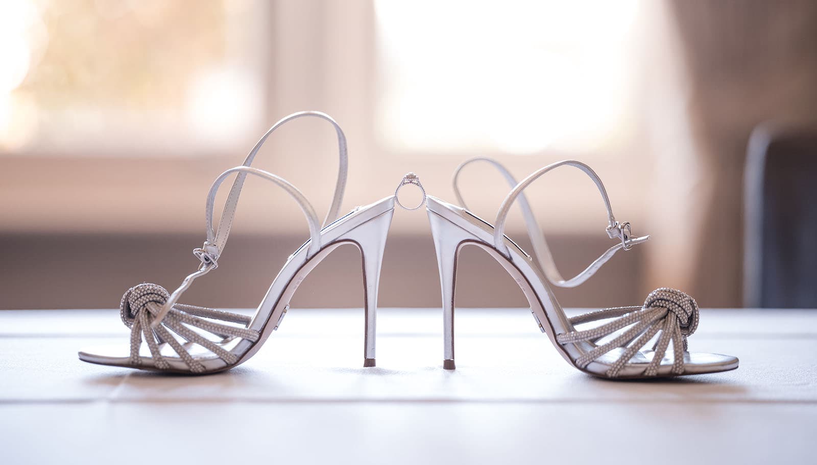 glenelg's partridge house wedding - emma & steven 125 Engagement ring perched between high heels