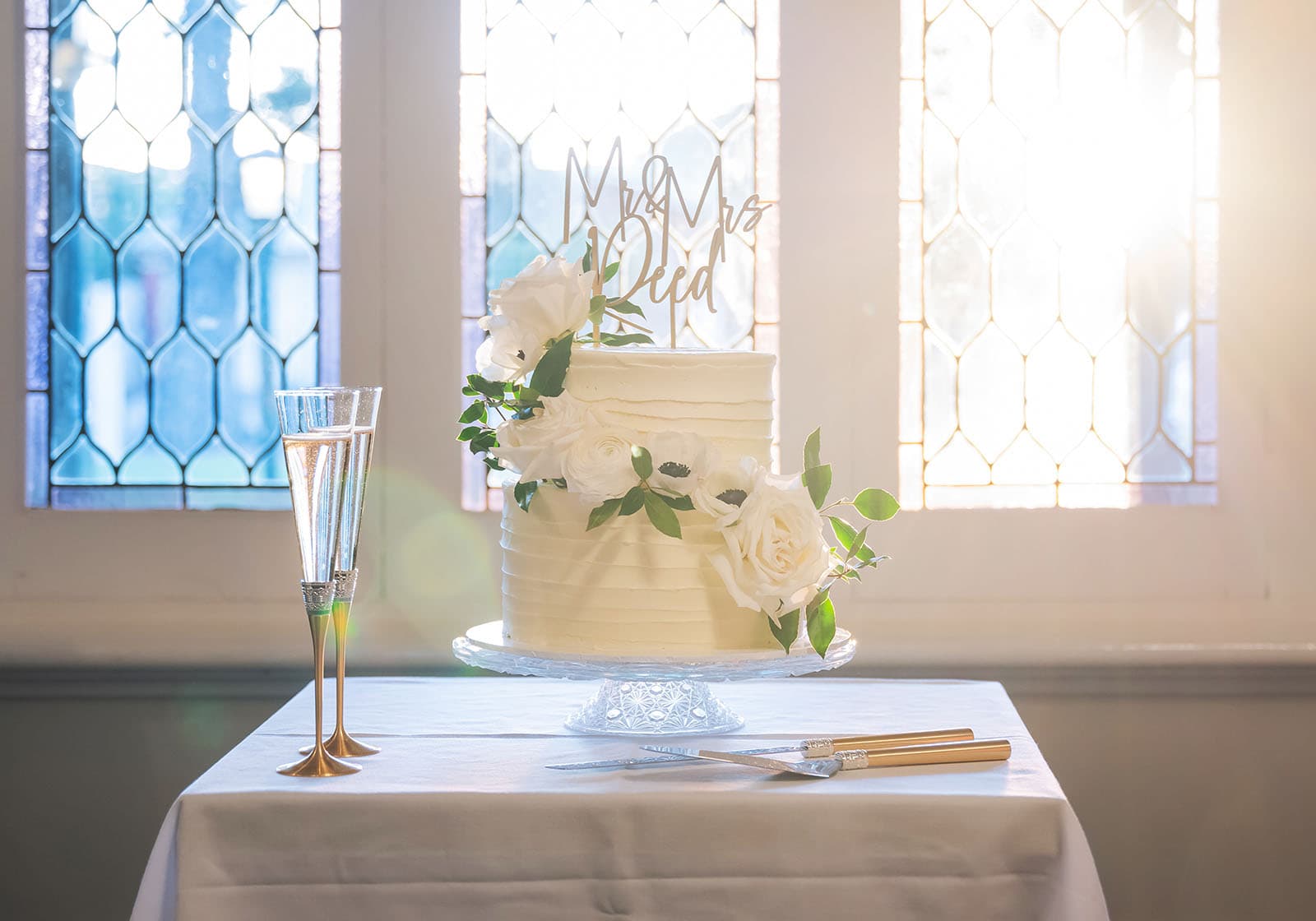 glenelg's partridge house wedding - emma & steven 168 Wedding cake bathed in light