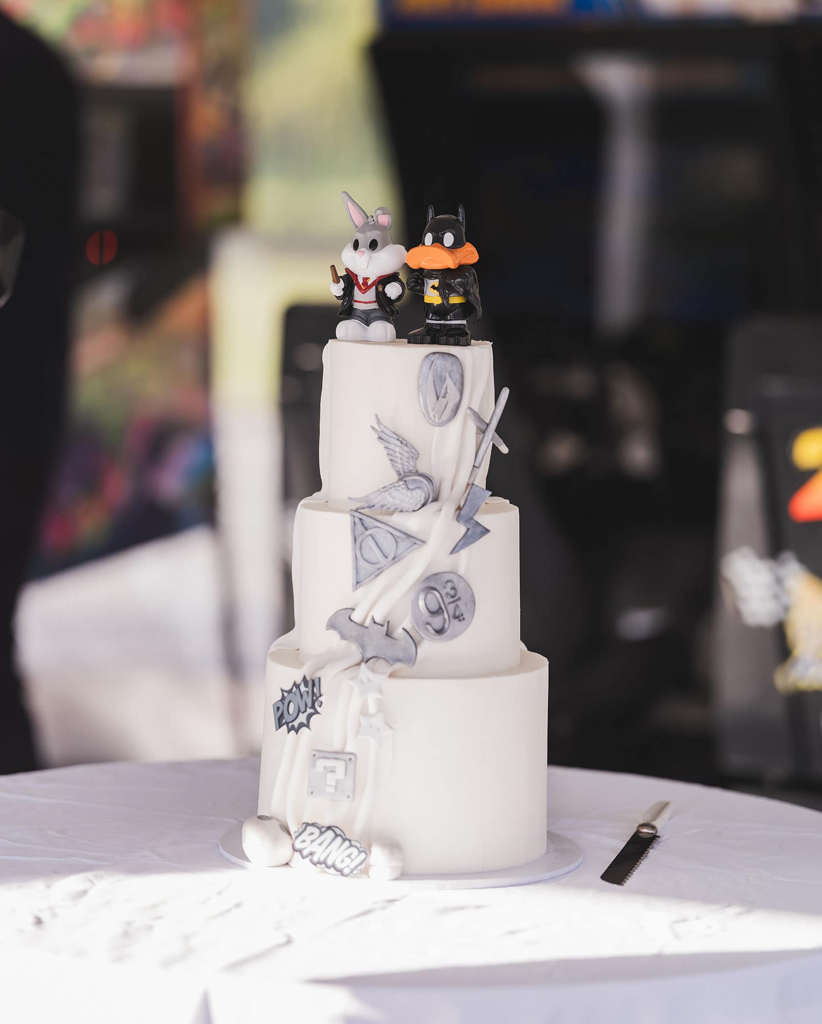 tiny house on the prairie wedding - kat & stacey 112 Wedding cake topped with Bugs Bunnya nd Daffy Duck