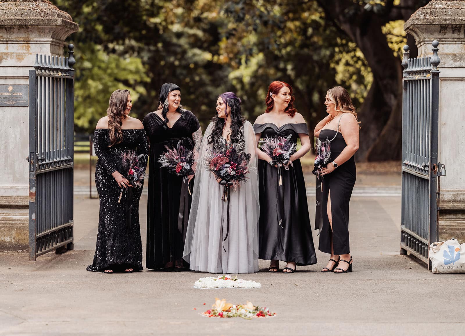 palm house gardens wedding - ayla & drew 140 Bridal party standing at friendship gates