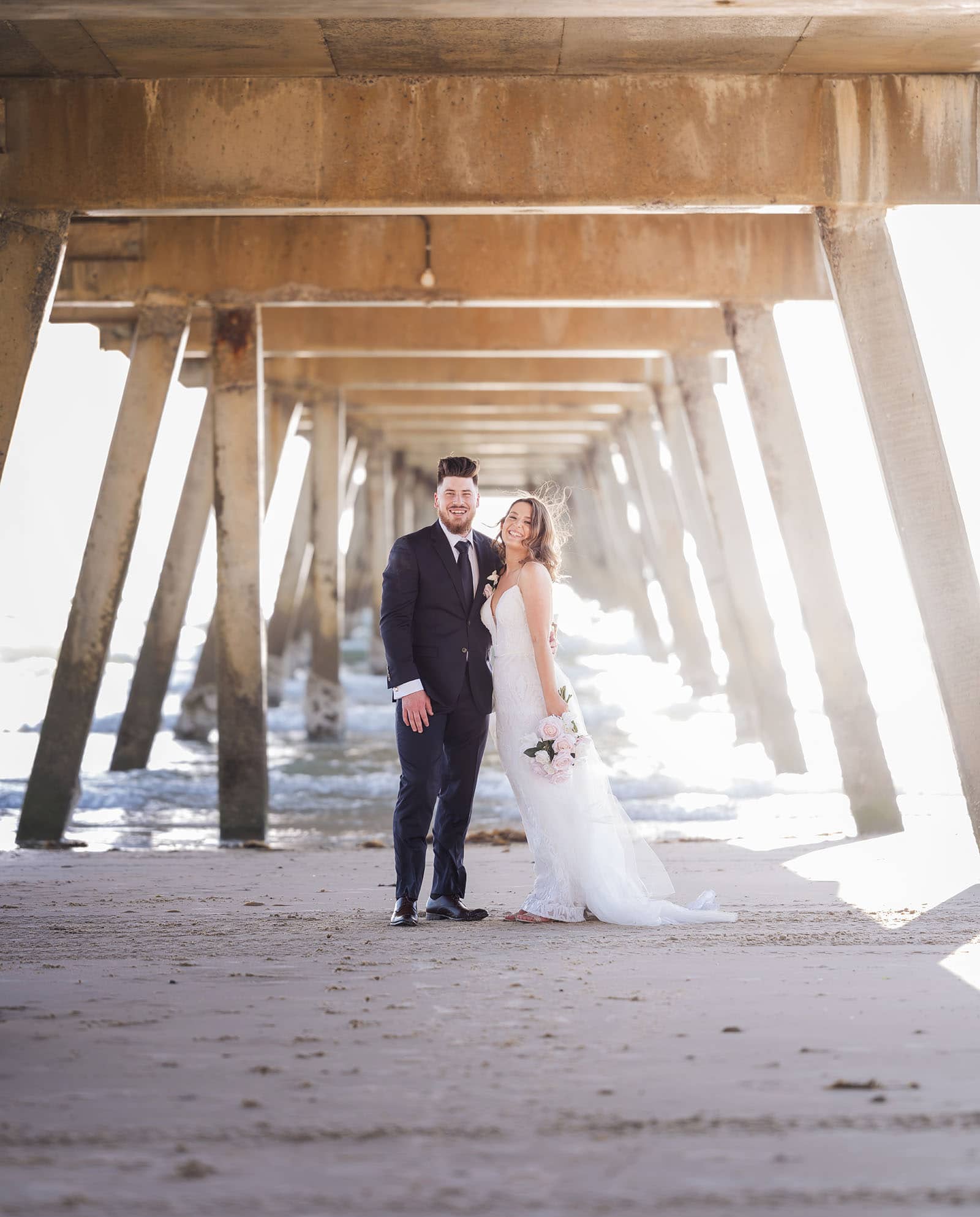 stamford grand wedding - jess & tim 79 Bridal portrait under Glenelg Jetty