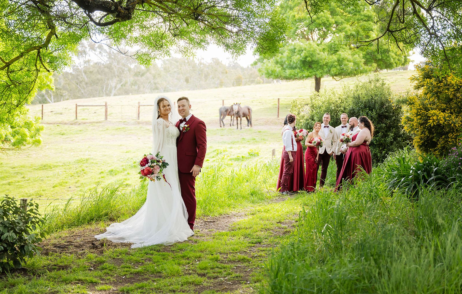 templewood house wedding - michelle & andrew 25 bride and groom standing away from bridal party