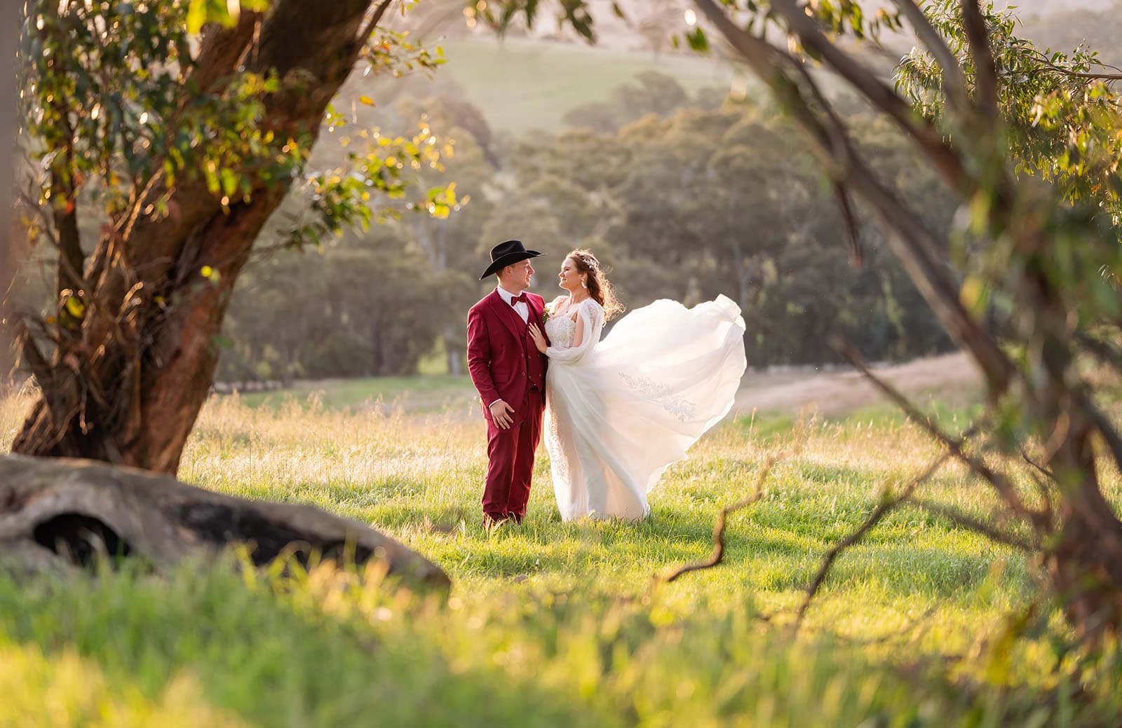 templewood house wedding - michelle & andrew 35 Bride and groom under gum trees