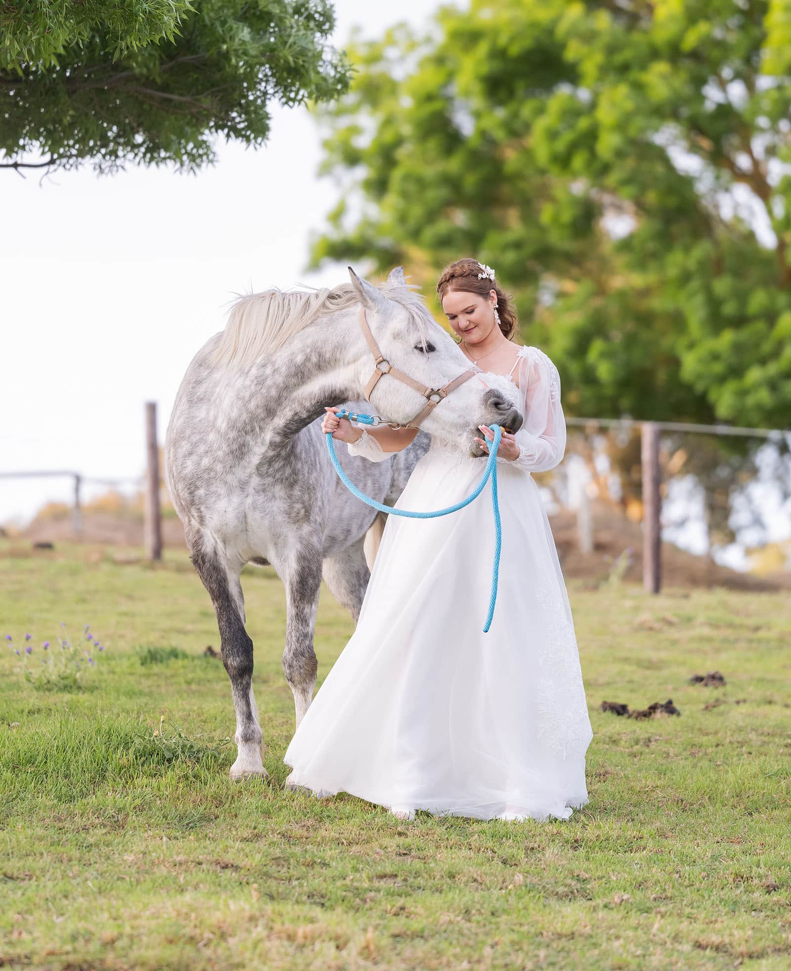 templewood house wedding - michelle & andrew 34 Bride hugging horse