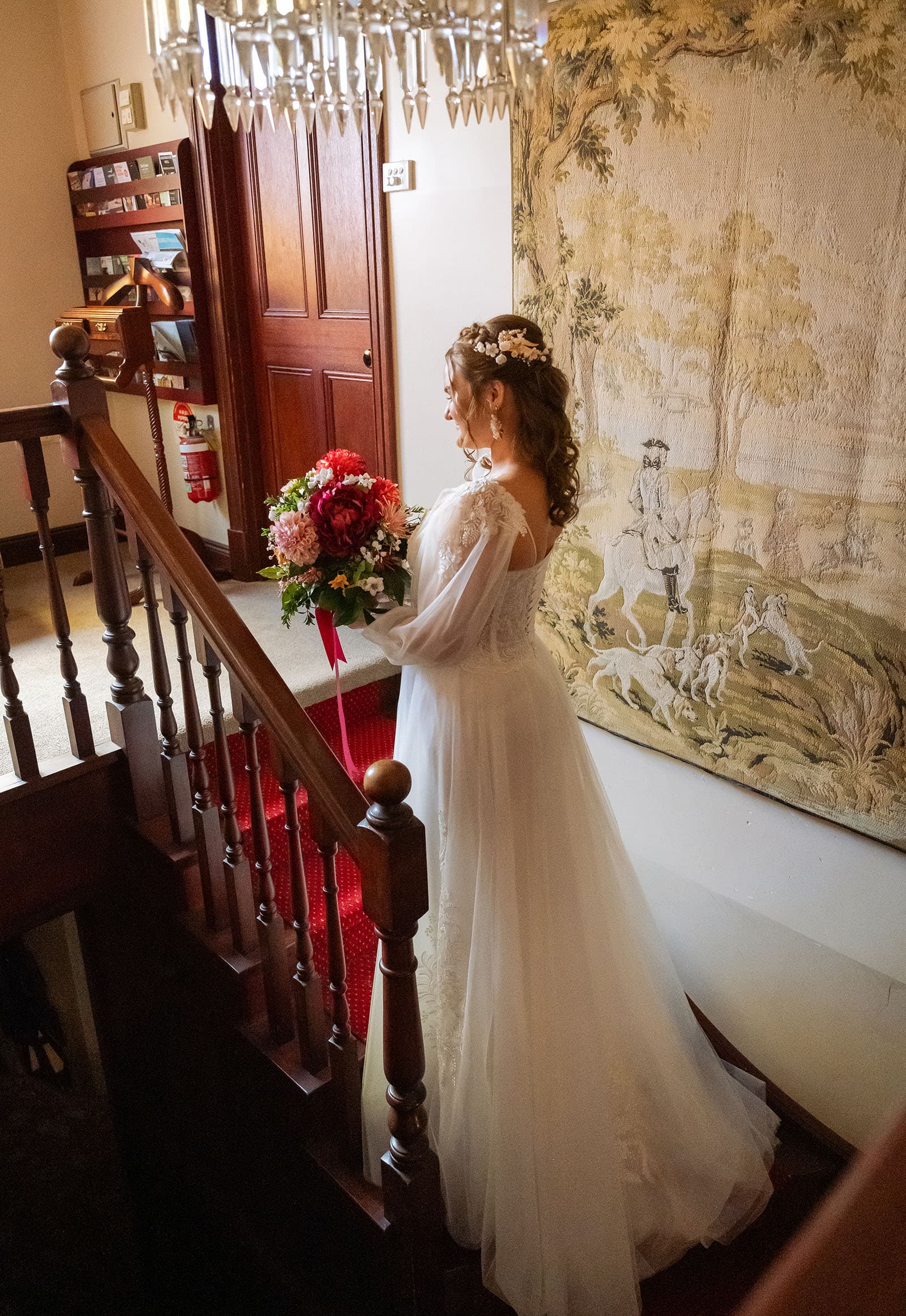 templewood house wedding - michelle & andrew 7 bride standing on staircase