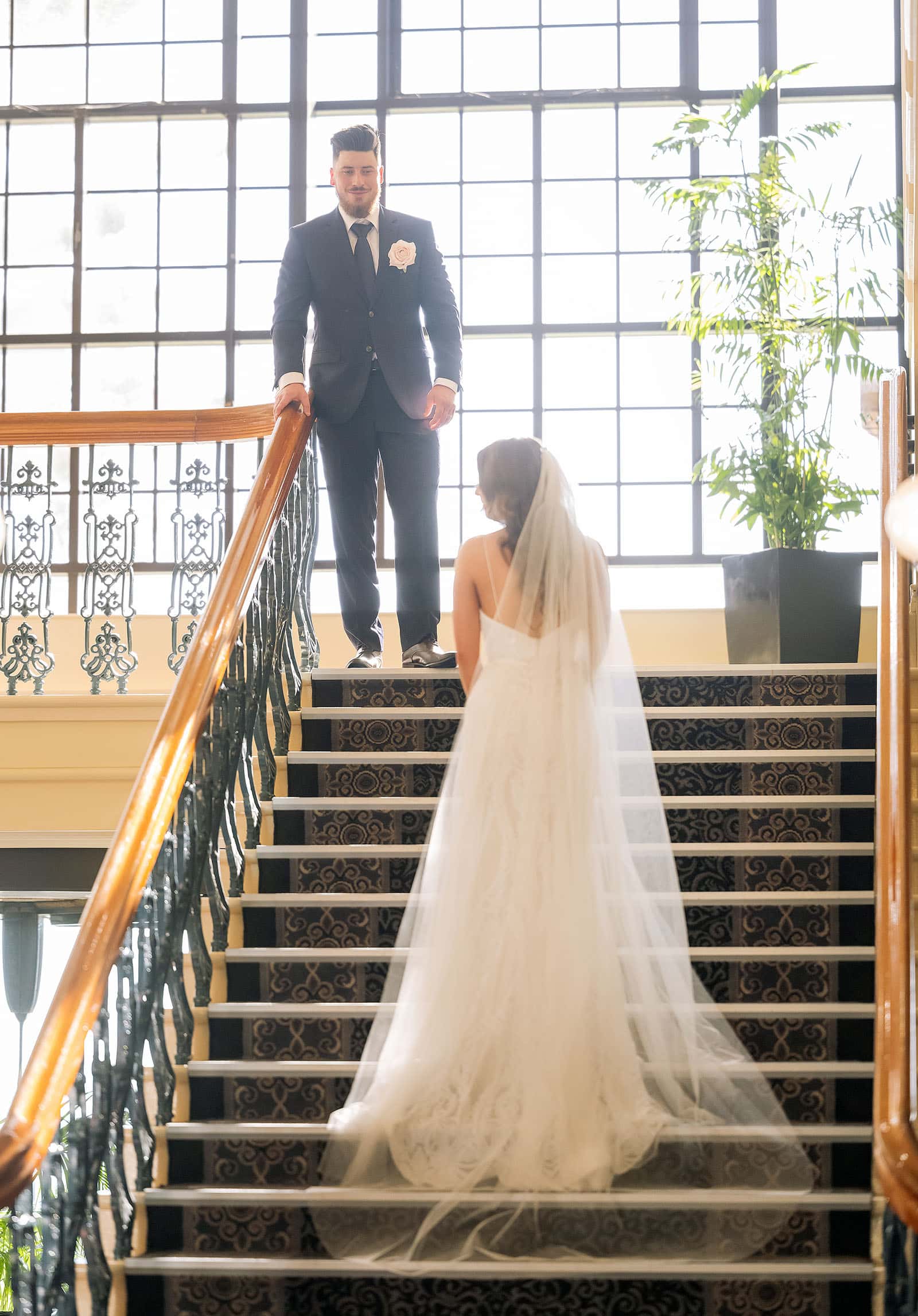 stamford grand wedding - jess & tim 71 Brie ascending staircase
