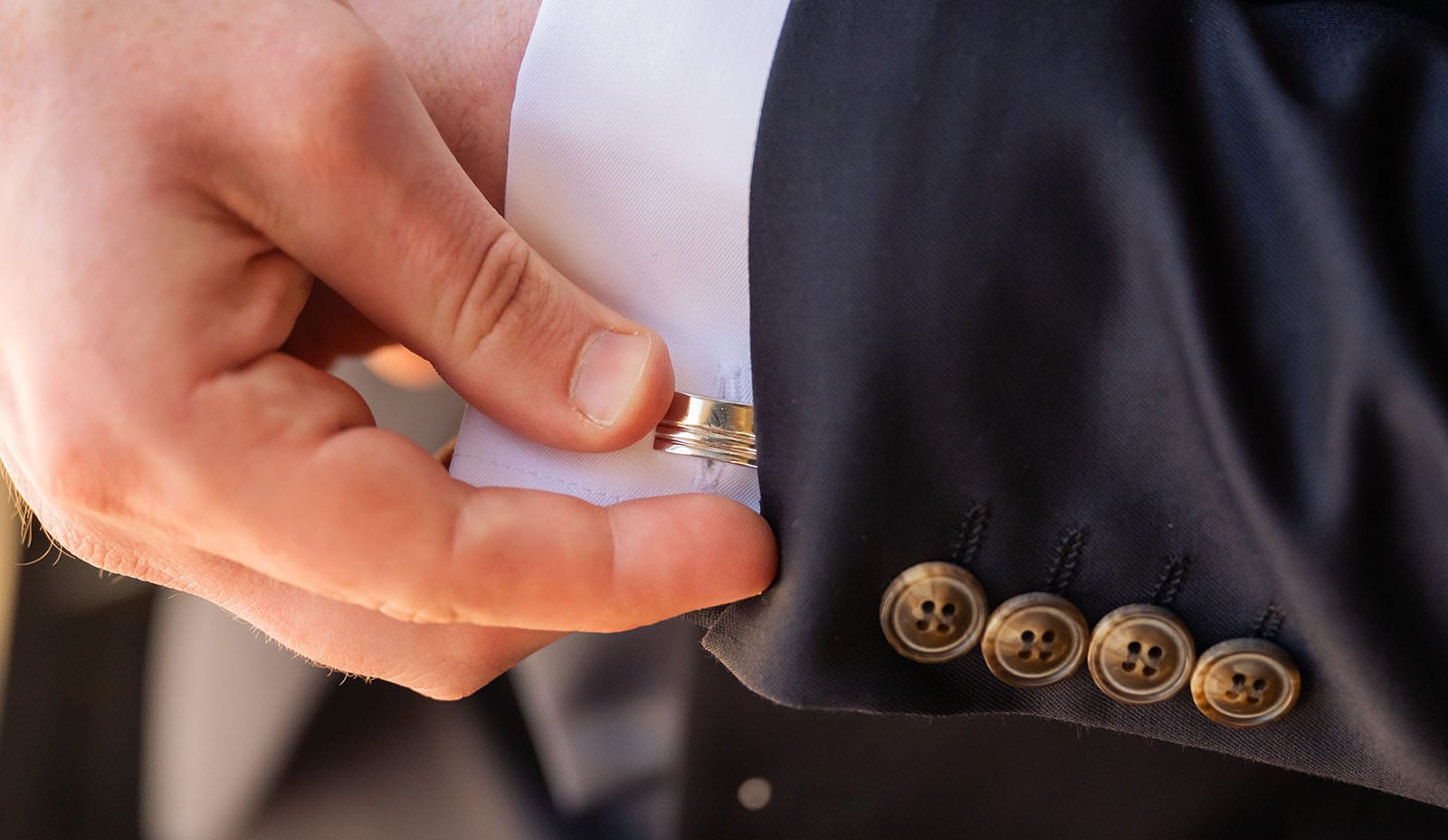 stamford grand wedding - jess & tim 45 Close up of grooms cufflinks