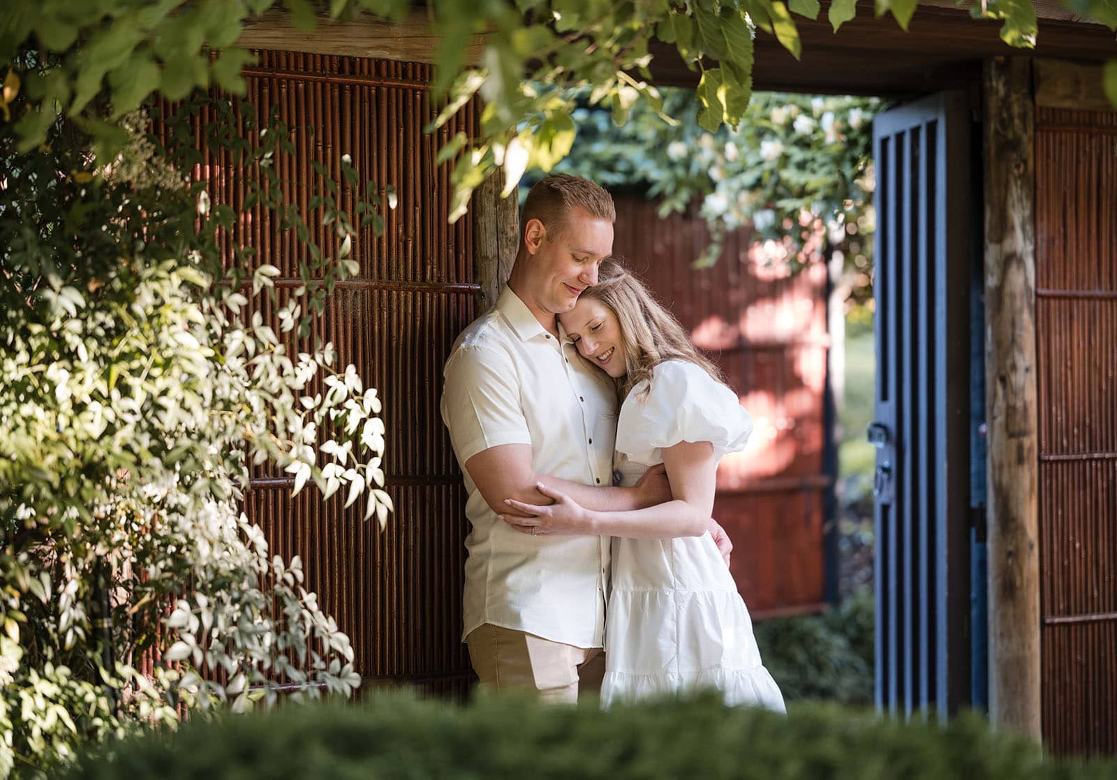 adelaide parklands engagement shoot - stacey & jacob 185 Couple holding hands in Japanese garden