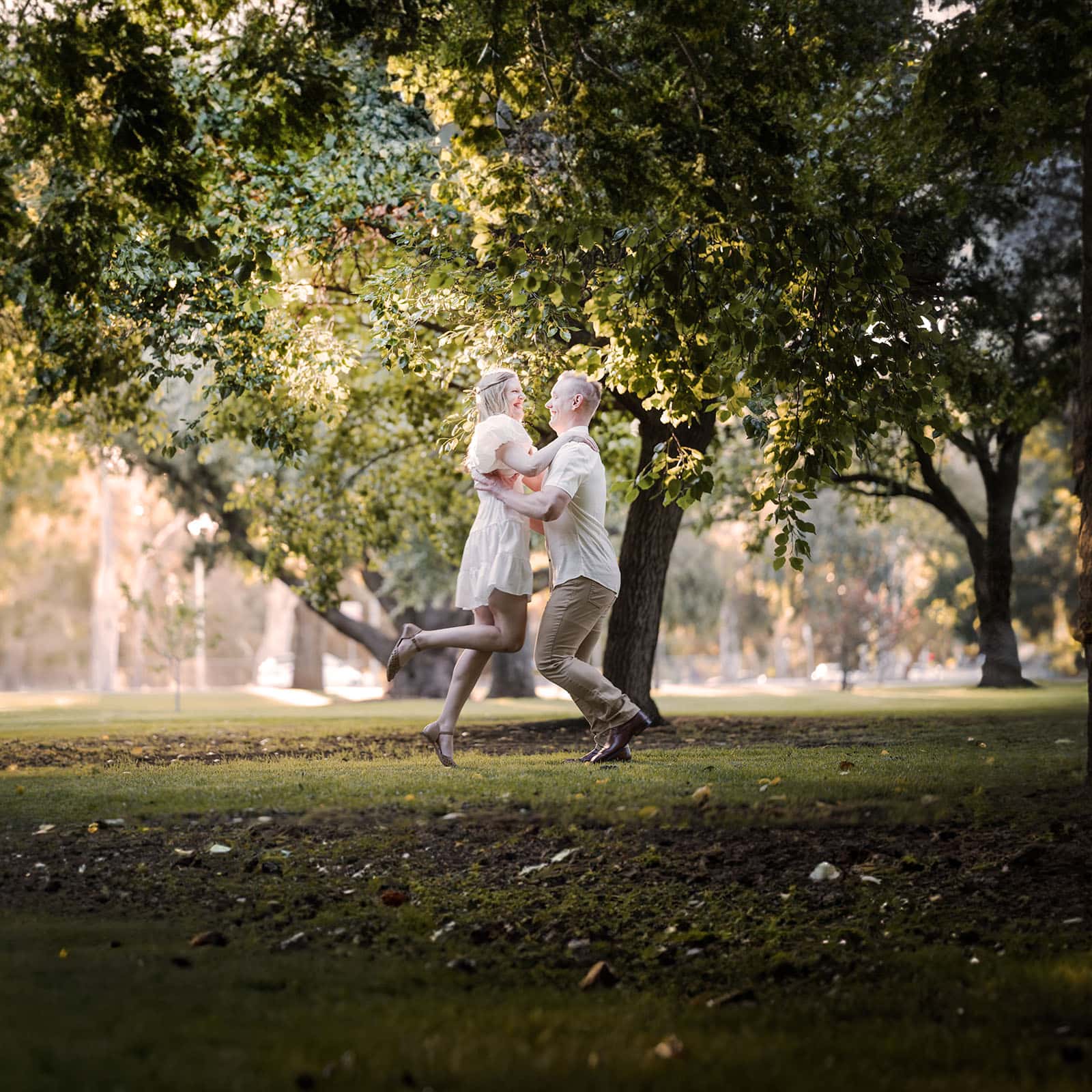 adelaide parklands engagement shoot - stacey & jacob 198 Couple jumping into one another