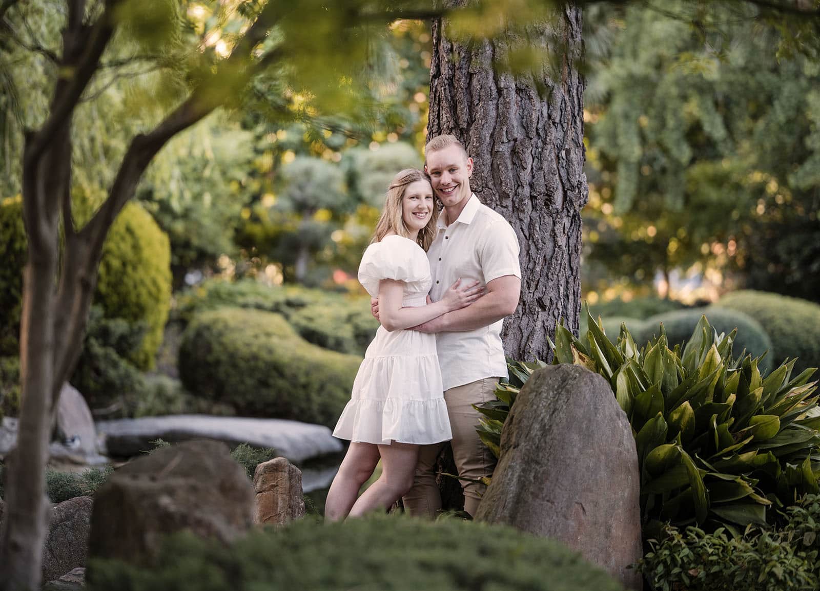 adelaide parklands engagement shoot - stacey & jacob 190 Couple surrounded by vibrant garden flora