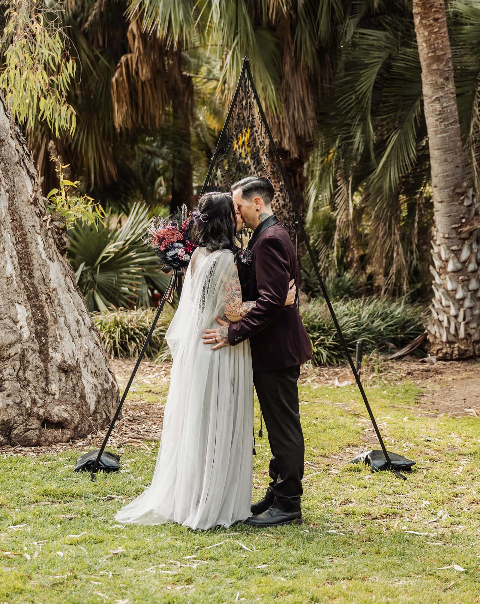 palm house gardens wedding - ayla & drew 152 First kiss at Northern palm Gardens wedding Ceremony
