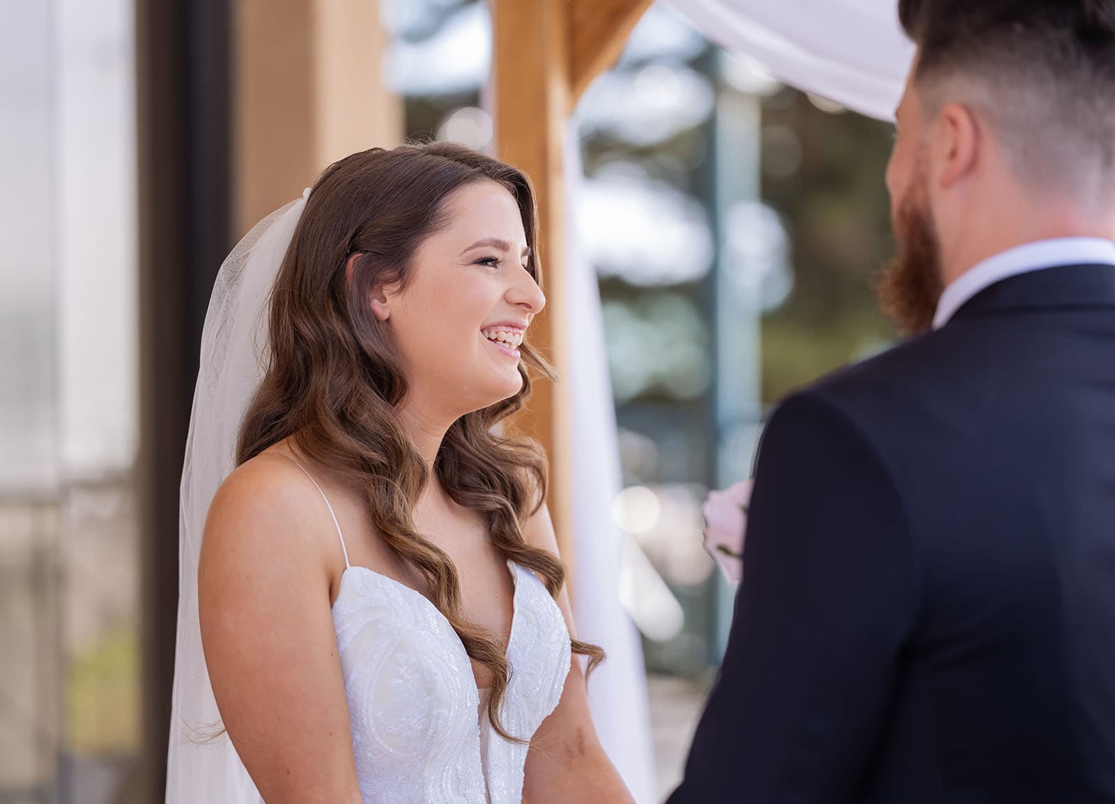 stamford grand wedding - jess & tim 64 Grinning bride at ceremony