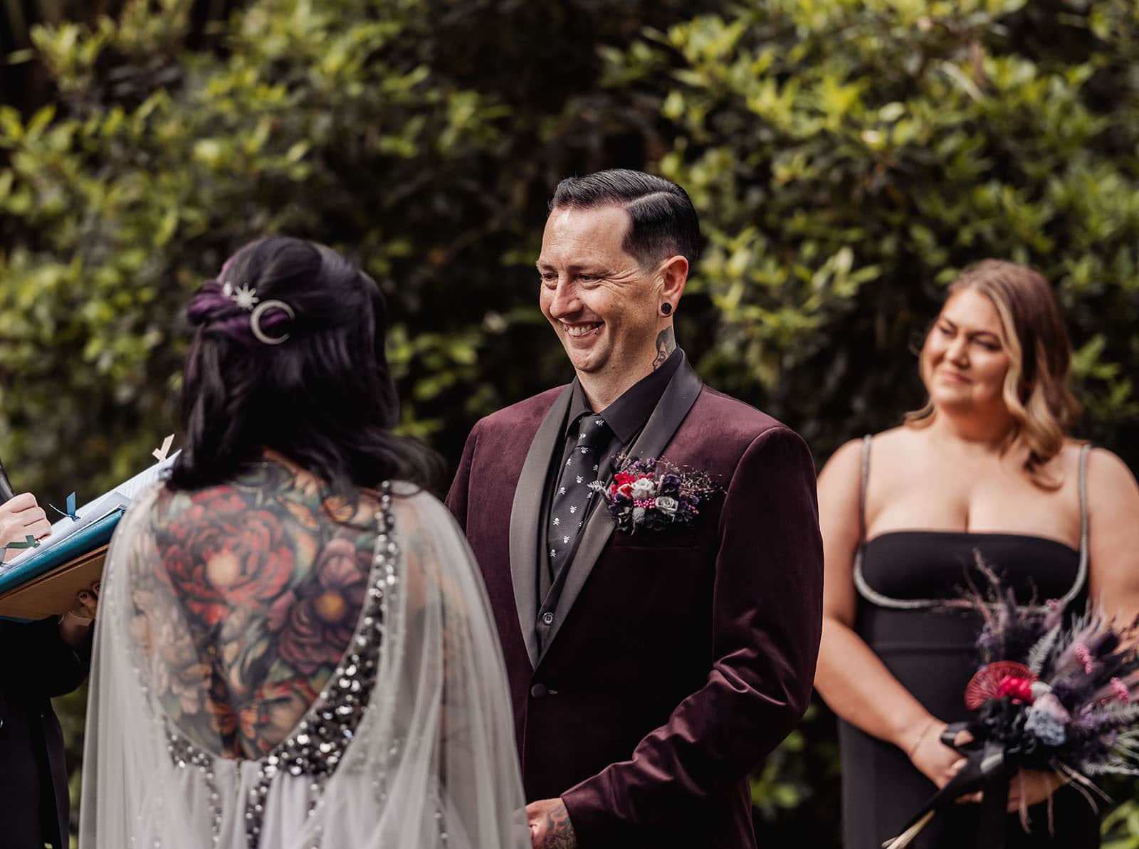 palm house gardens wedding - ayla & drew 145 Grinning Groom in red suit