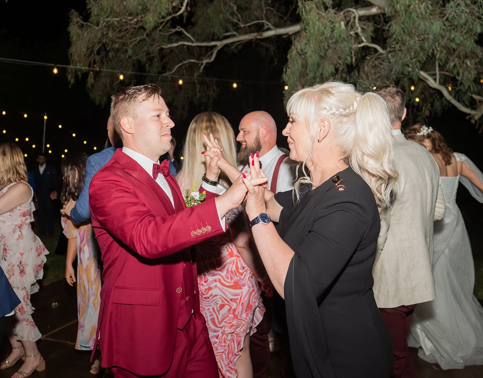 templewood house wedding - michelle & andrew 52 Groom dancing with Mum