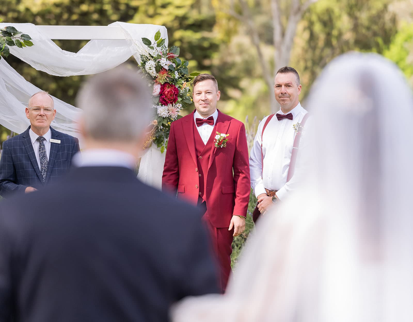 templewood house wedding - michelle & andrew 13 Groom's first look through the shoulders of the Bride and Father
