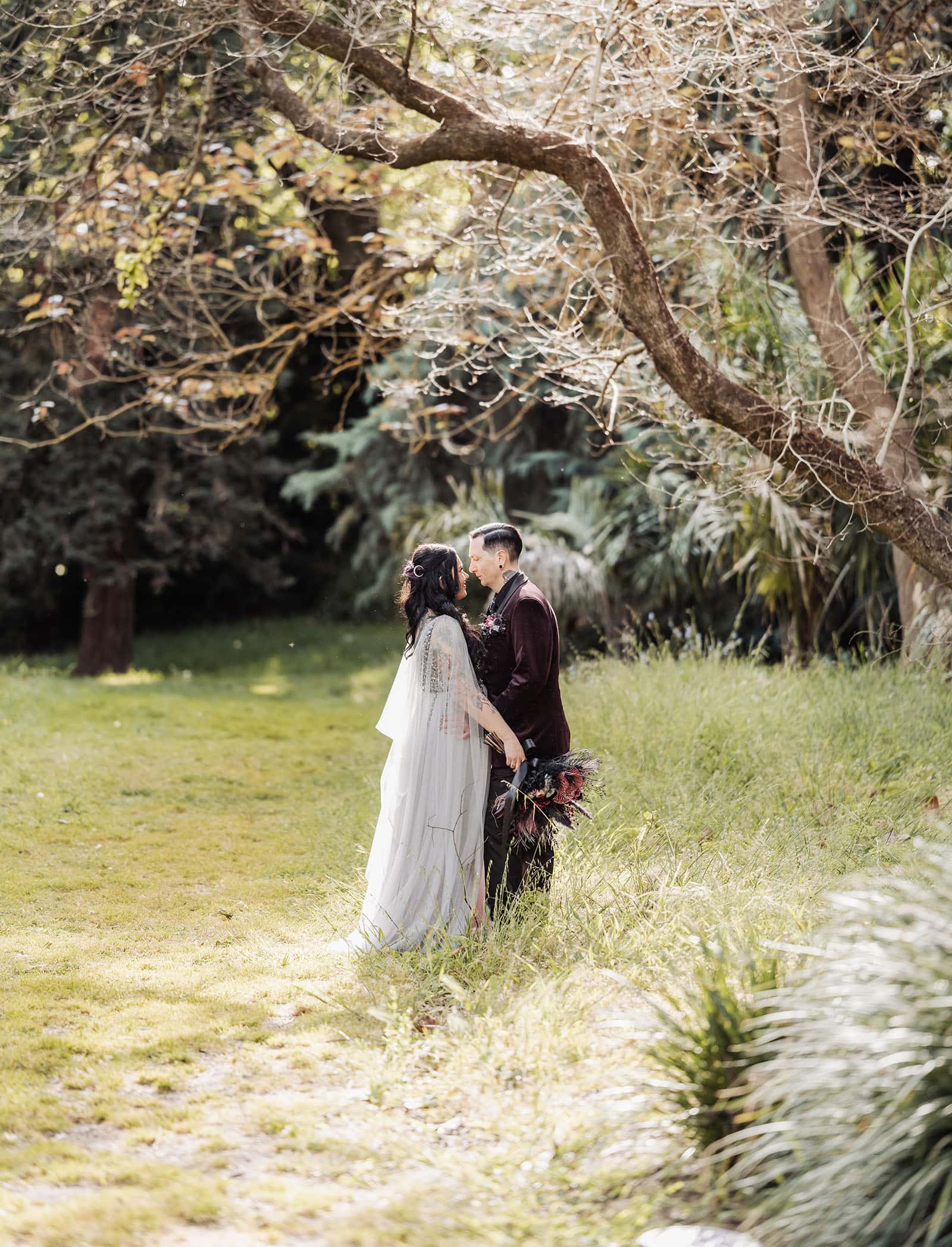 palm house gardens wedding - ayla & drew 159 Kiss under tree