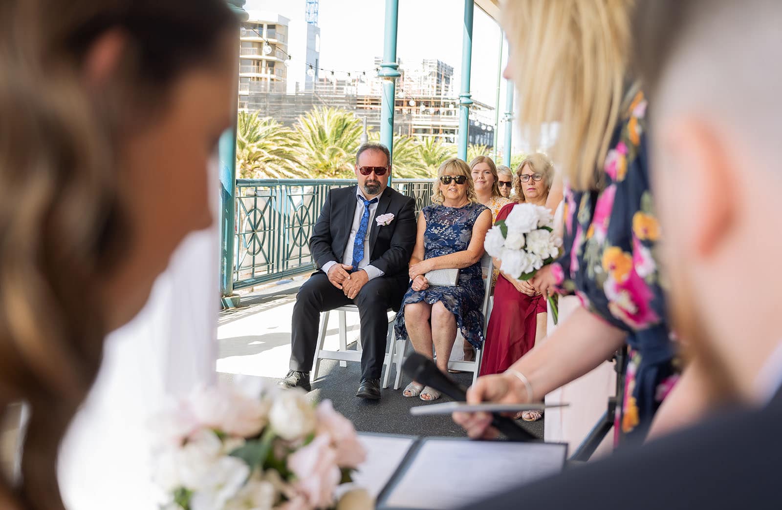 stamford grand wedding - jess & tim 67 Parents watching certificate signing