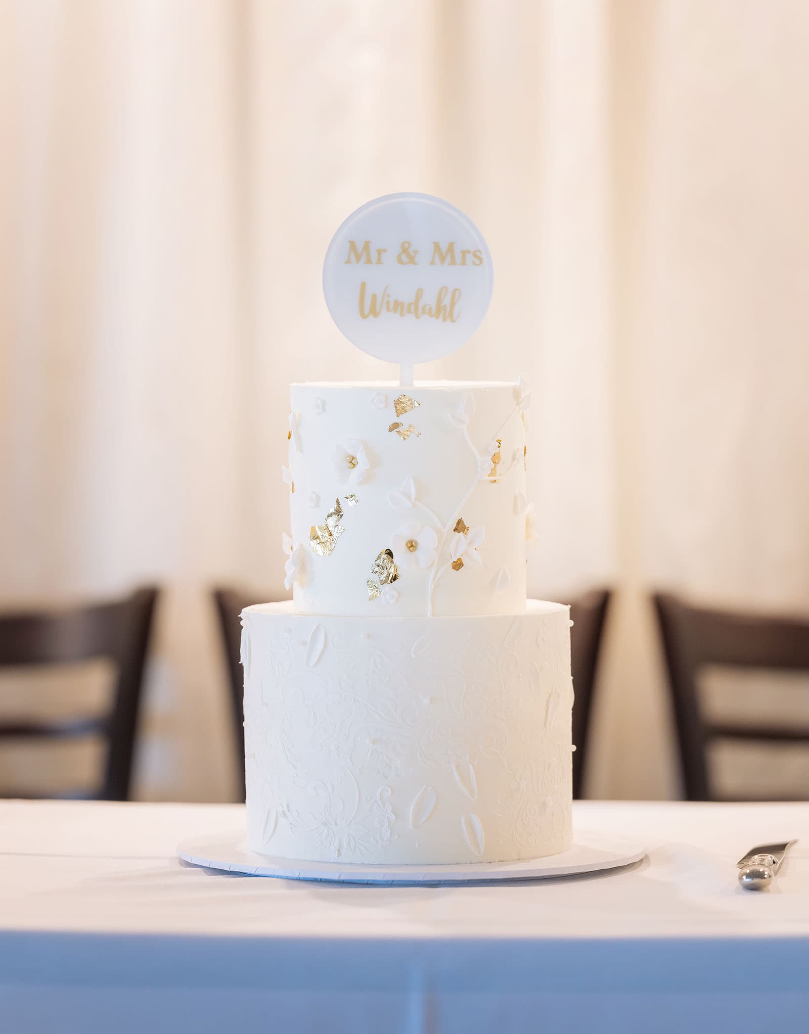 stamford grand wedding - jess & tim 86 Two tiered white weddign cake