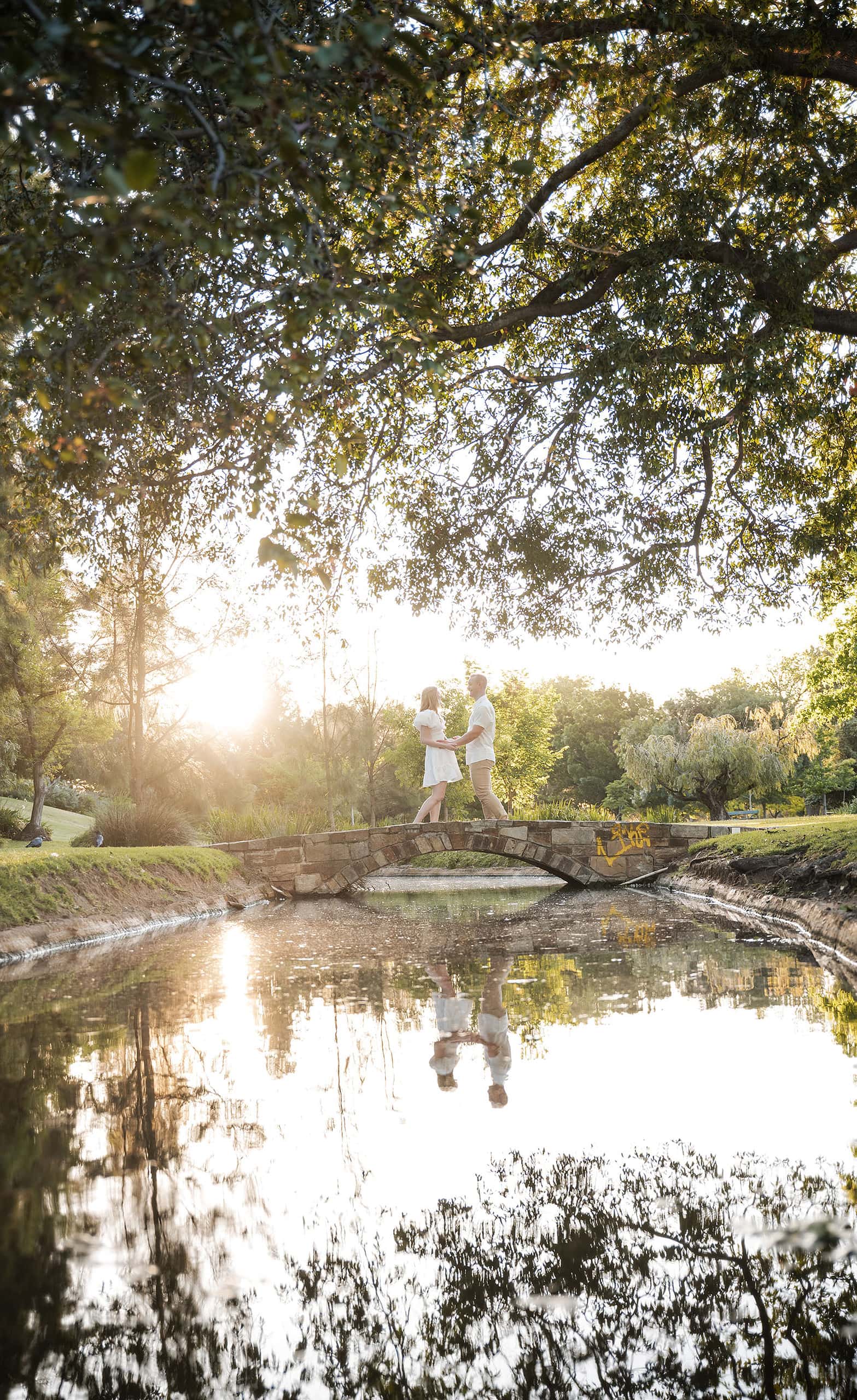 adelaide parklands engagement shoot - stacey & jacob 200 Walking across the Veal Gardens Bridge