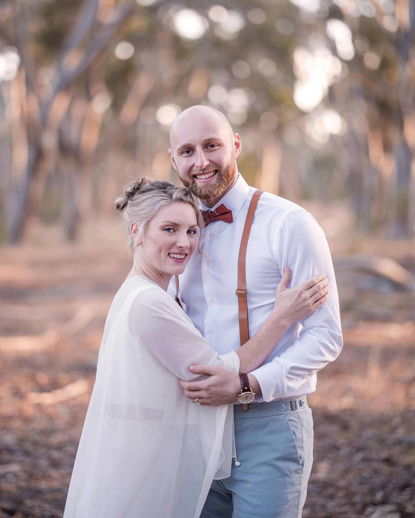 belair national park engagement shoot - lindsey & jaden 28 Couple embracing in forest setting
