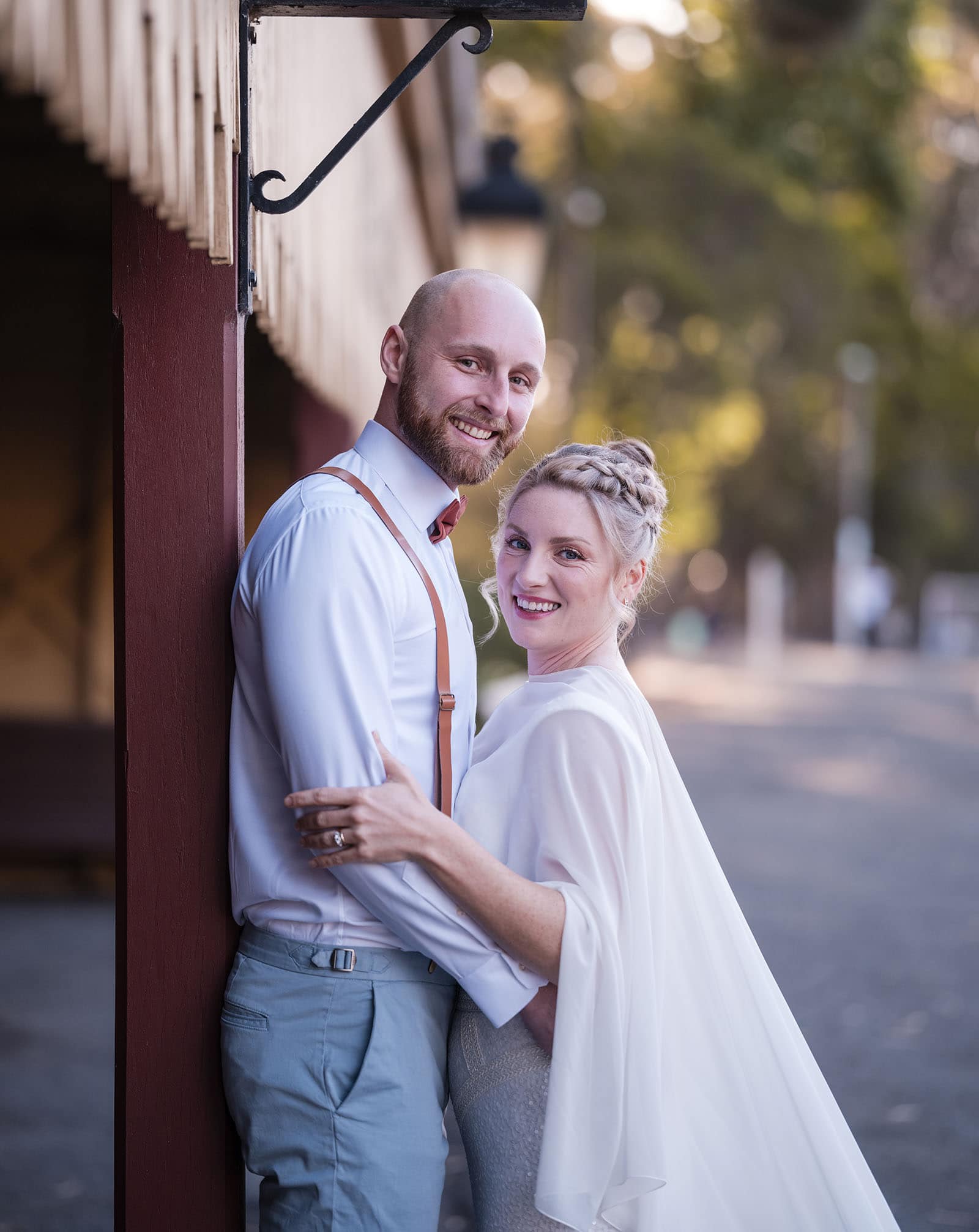 belair national park engagement shoot - lindsey & jaden 8 Happy couple embracing in elegant attire outdoors