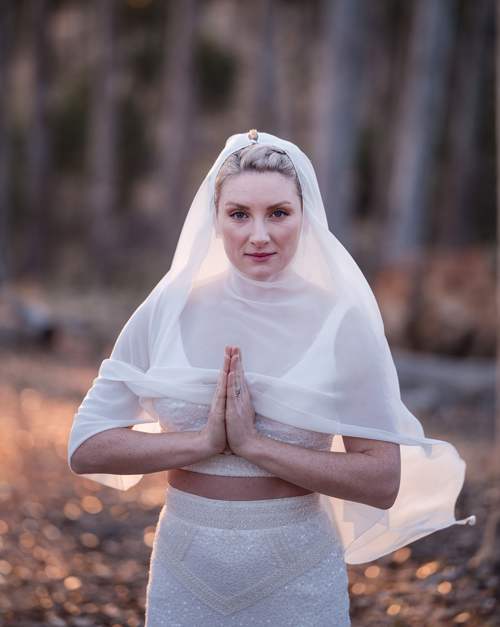 belair national park engagement shoot - lindsey & jaden 38 Bride in veil with hands together outdoors