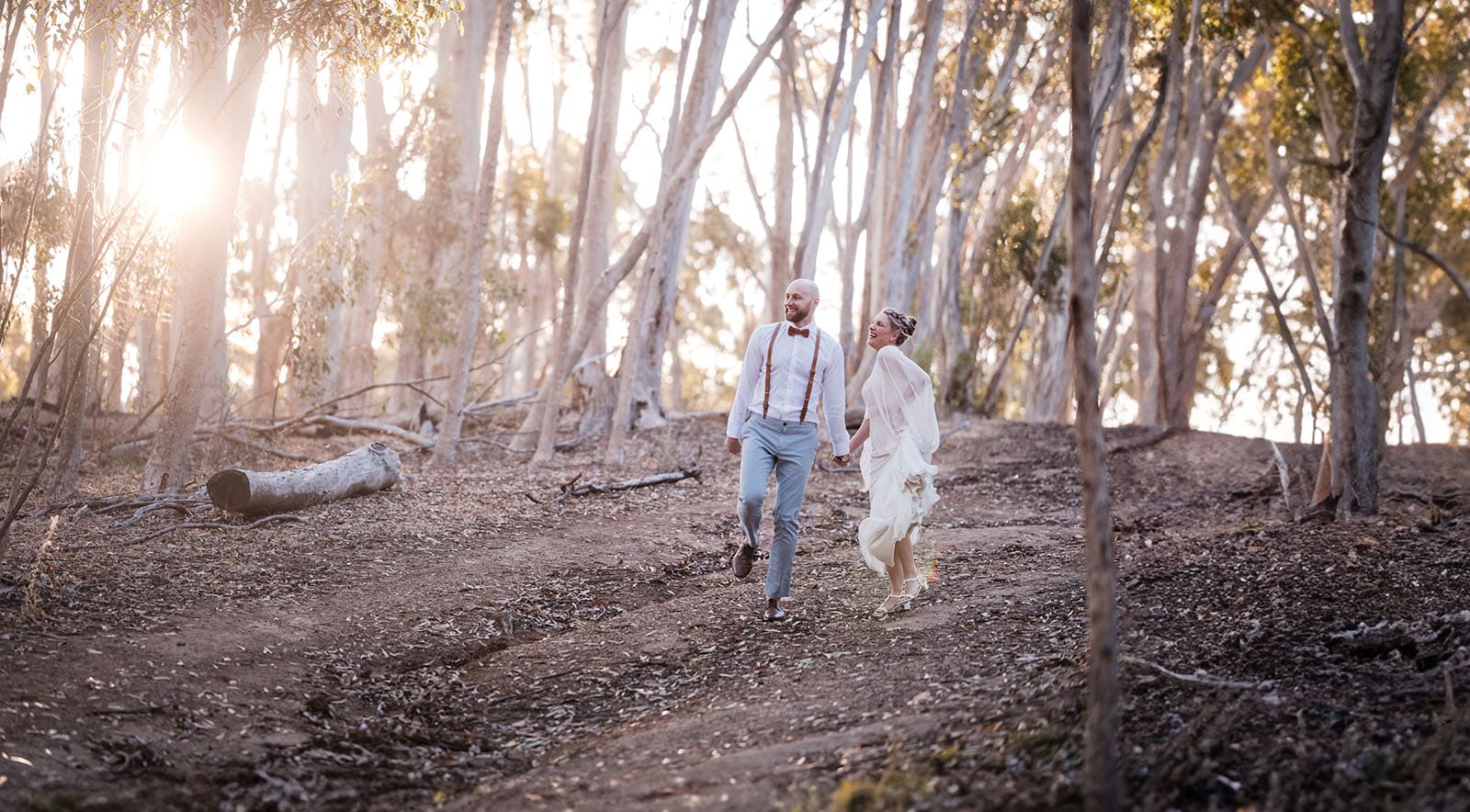 belair national park engagement shoot - lindsey & jaden 22 Couple walking in forest at sunset, wedding attire.